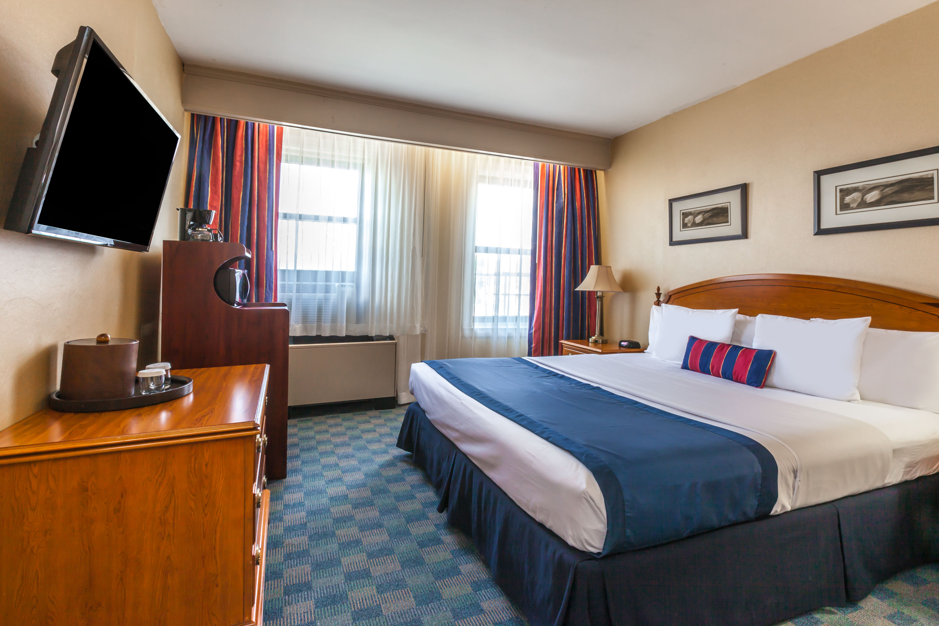 Guest room at the Ramada by Wyndham Jersey City in Jersey City, New Jersey