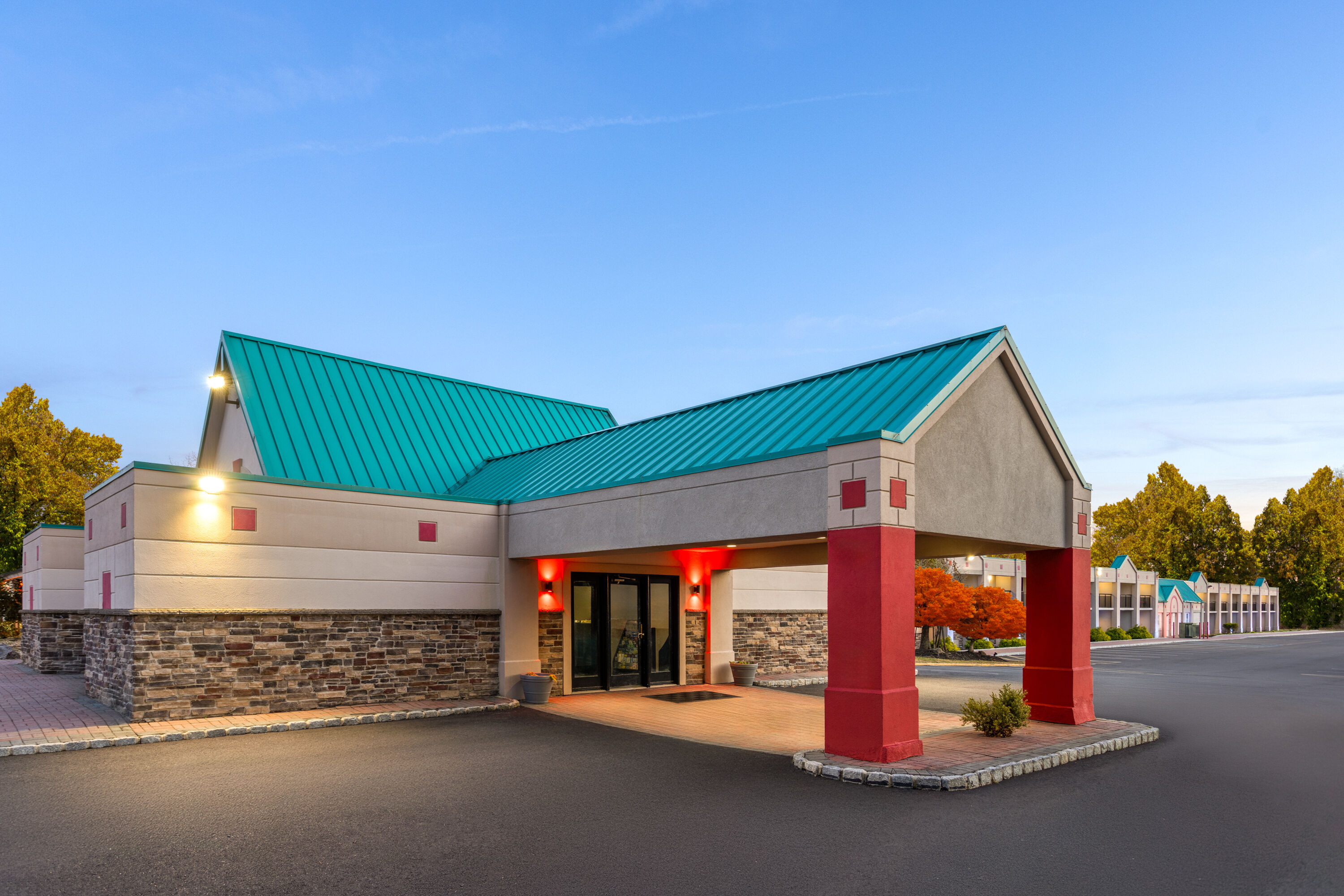 Exterior Dusk Image of Ramada by Wyndham Parsippany hotel in Parsippany, New Jersey