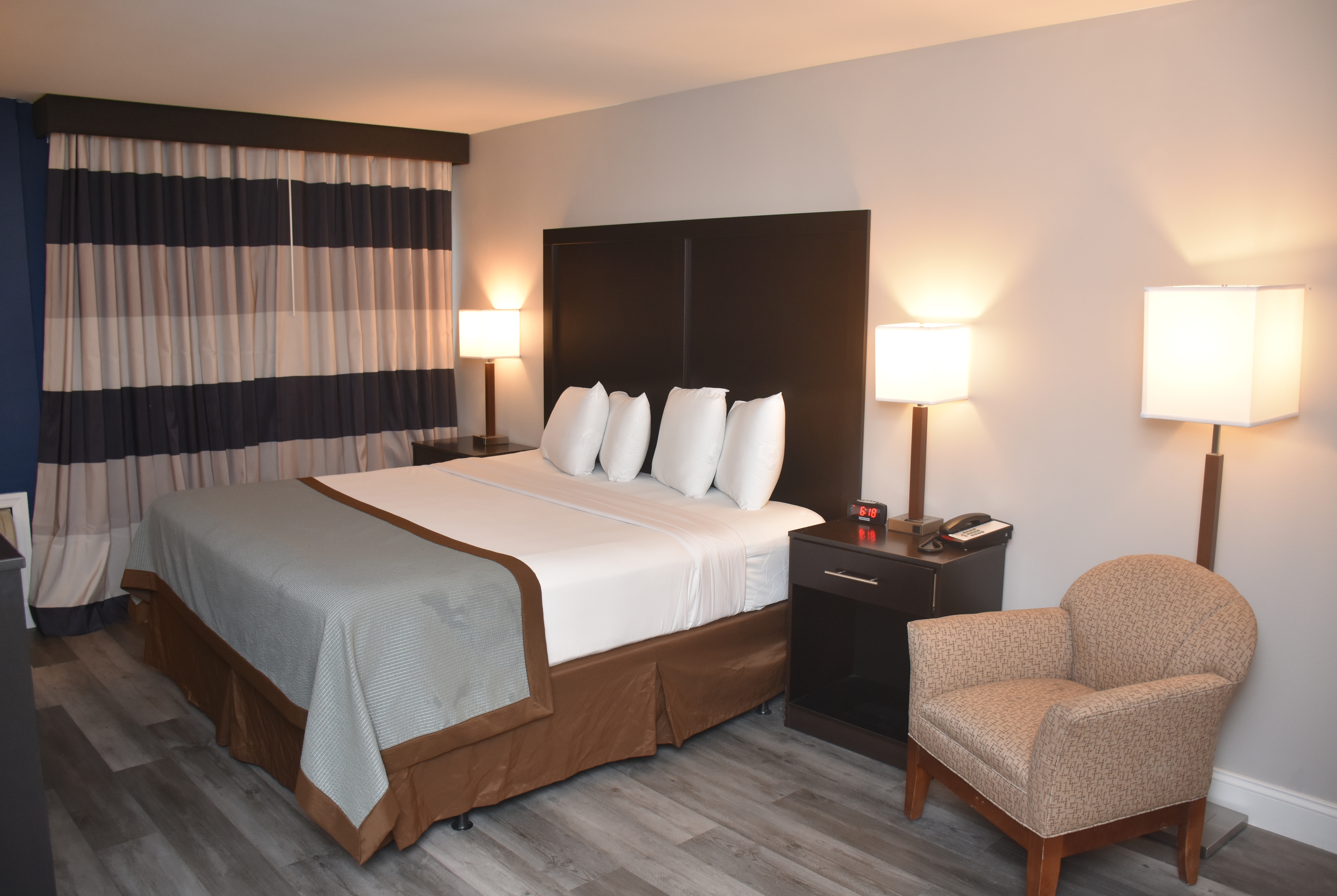 Guest room at the Ramada by Wyndham Vineland Millville Area in Vineland, New Jersey