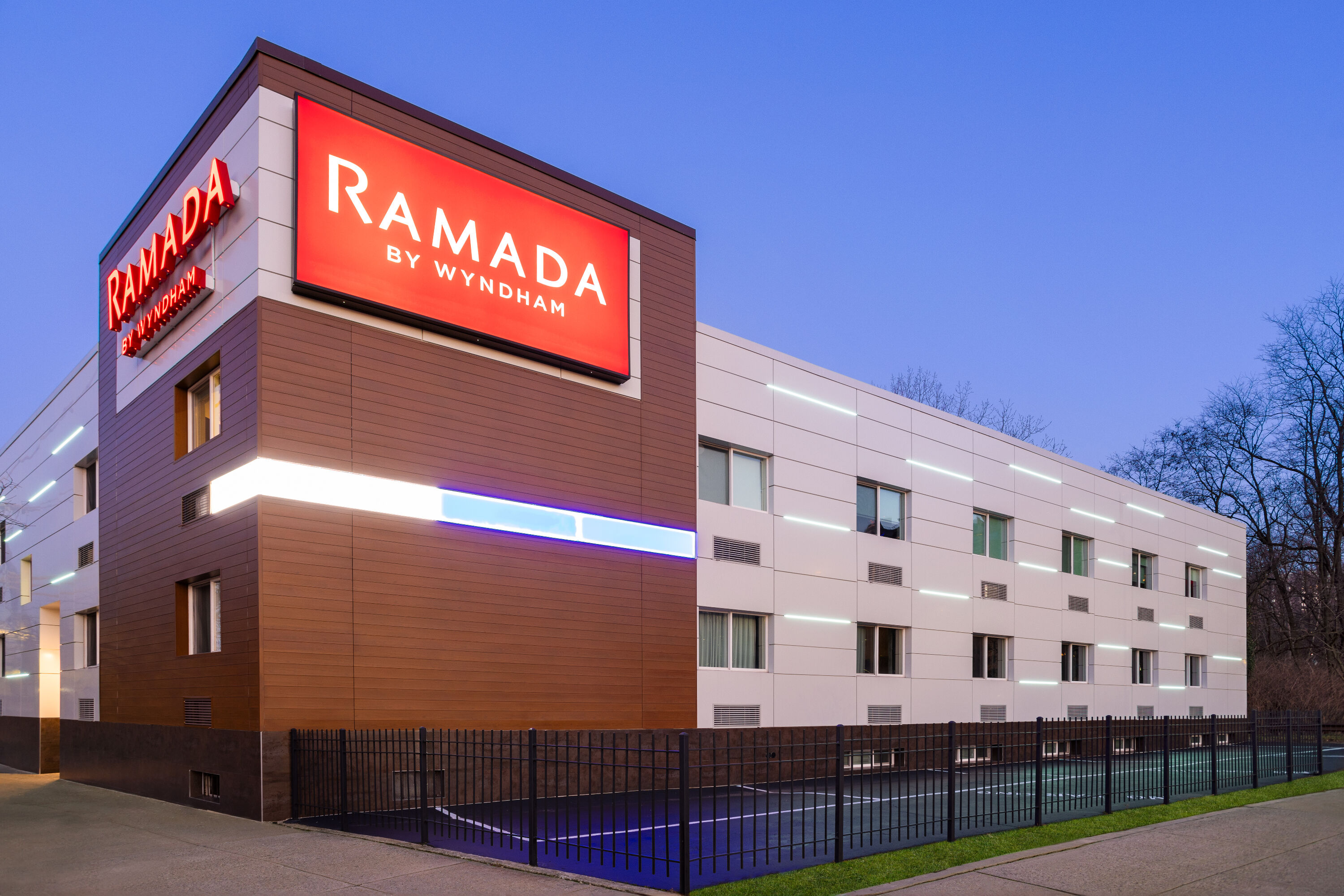 Exterior Dusk Image of Ramada by Wyndham Bronx hotel in Bronx, New York