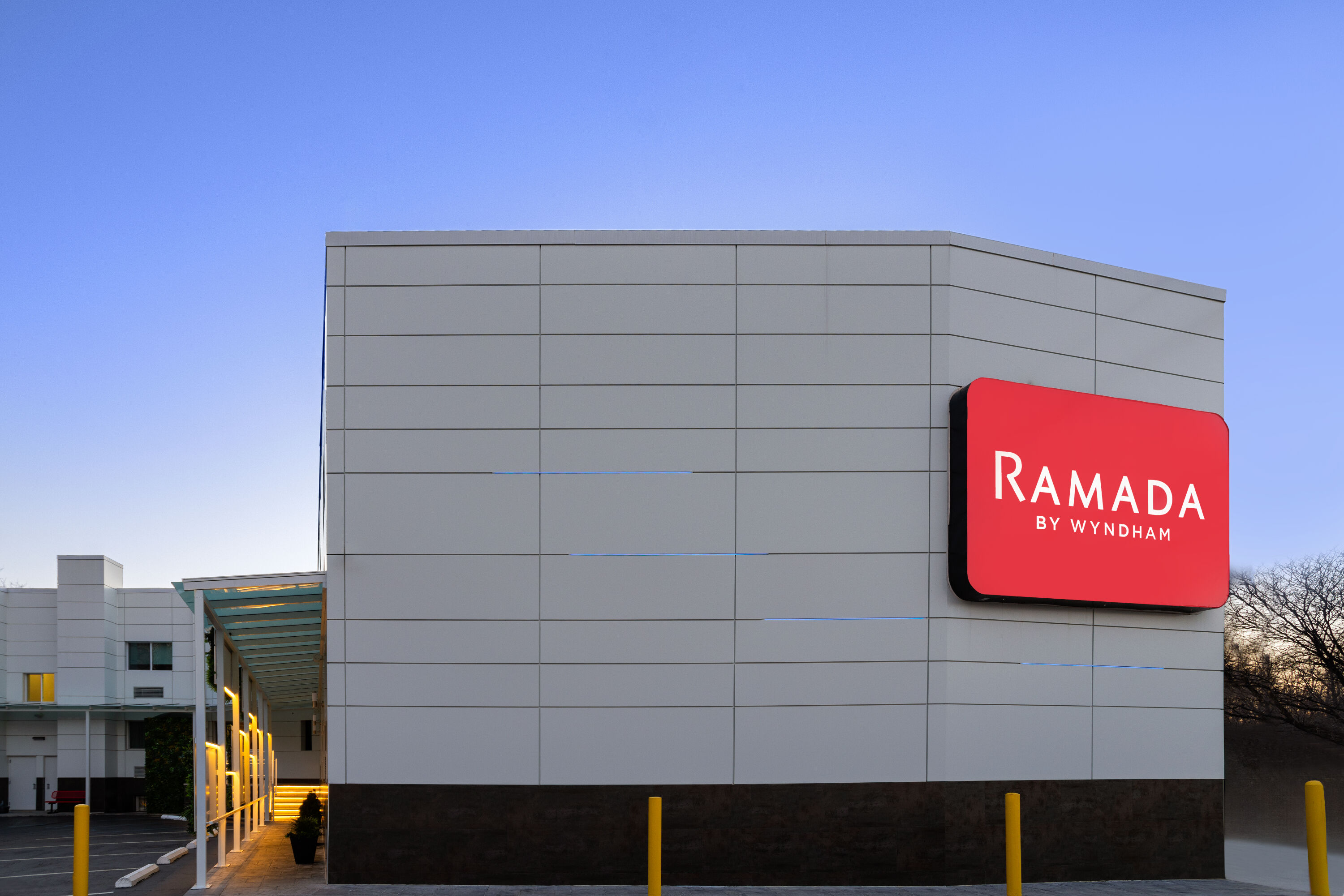 Exterior Dusk Image of Ramada by Wyndham Bronx hotel in Bronx, New York
