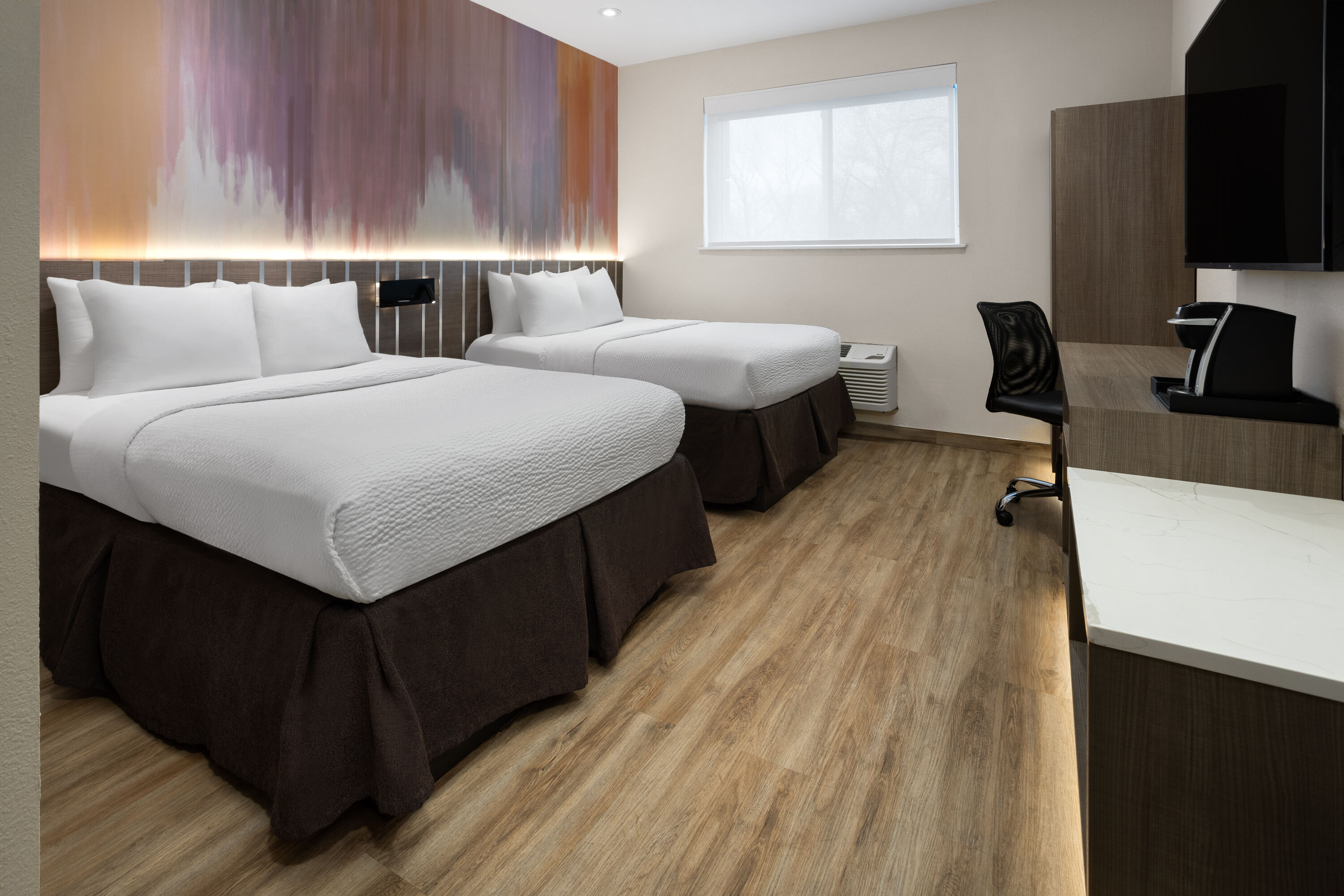 Guest room at the Ramada by Wyndham Bronx in Bronx, New York