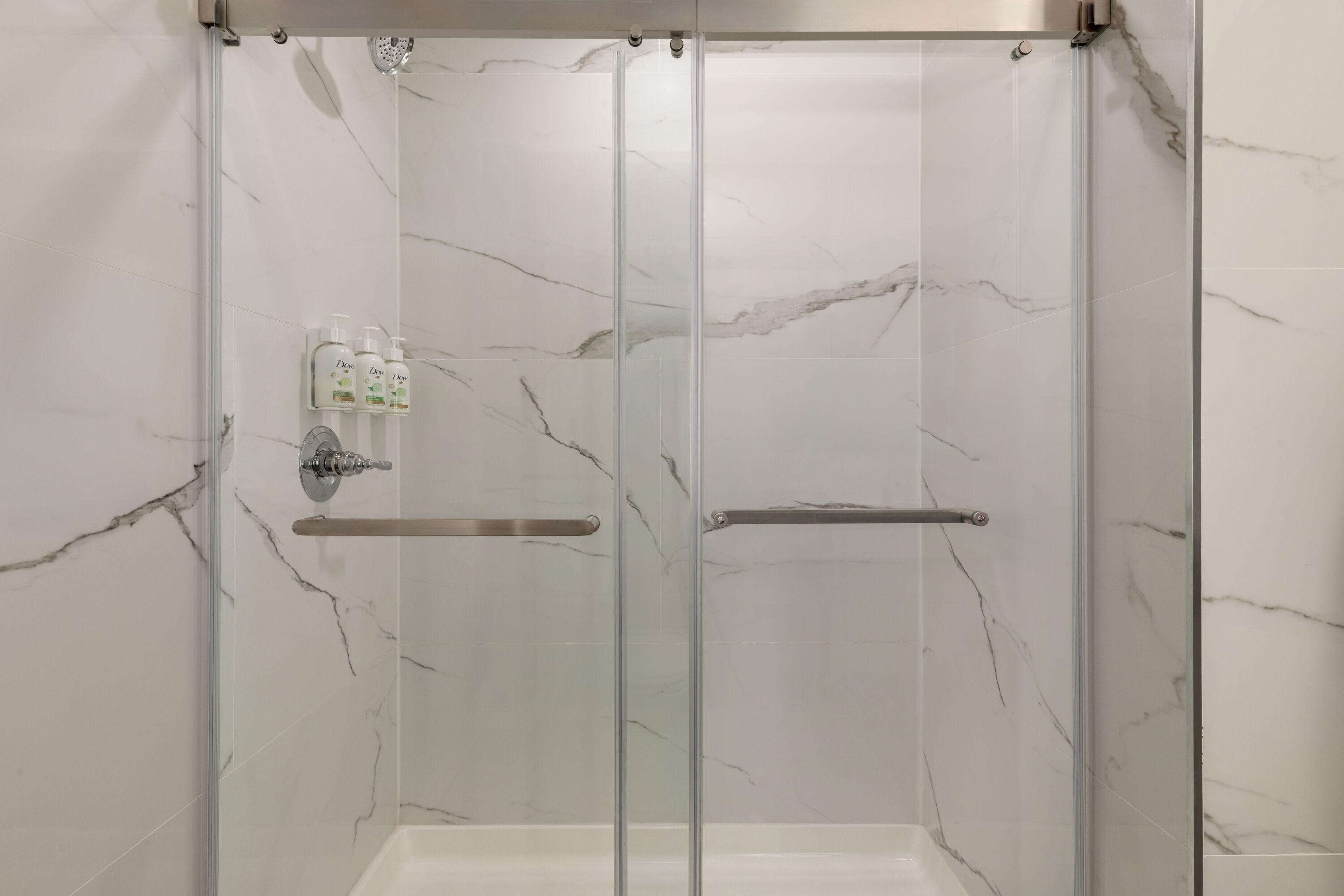 Guest room bath at the Ramada by Wyndham Brooklyn Empire Blvd in Brooklyn, New York