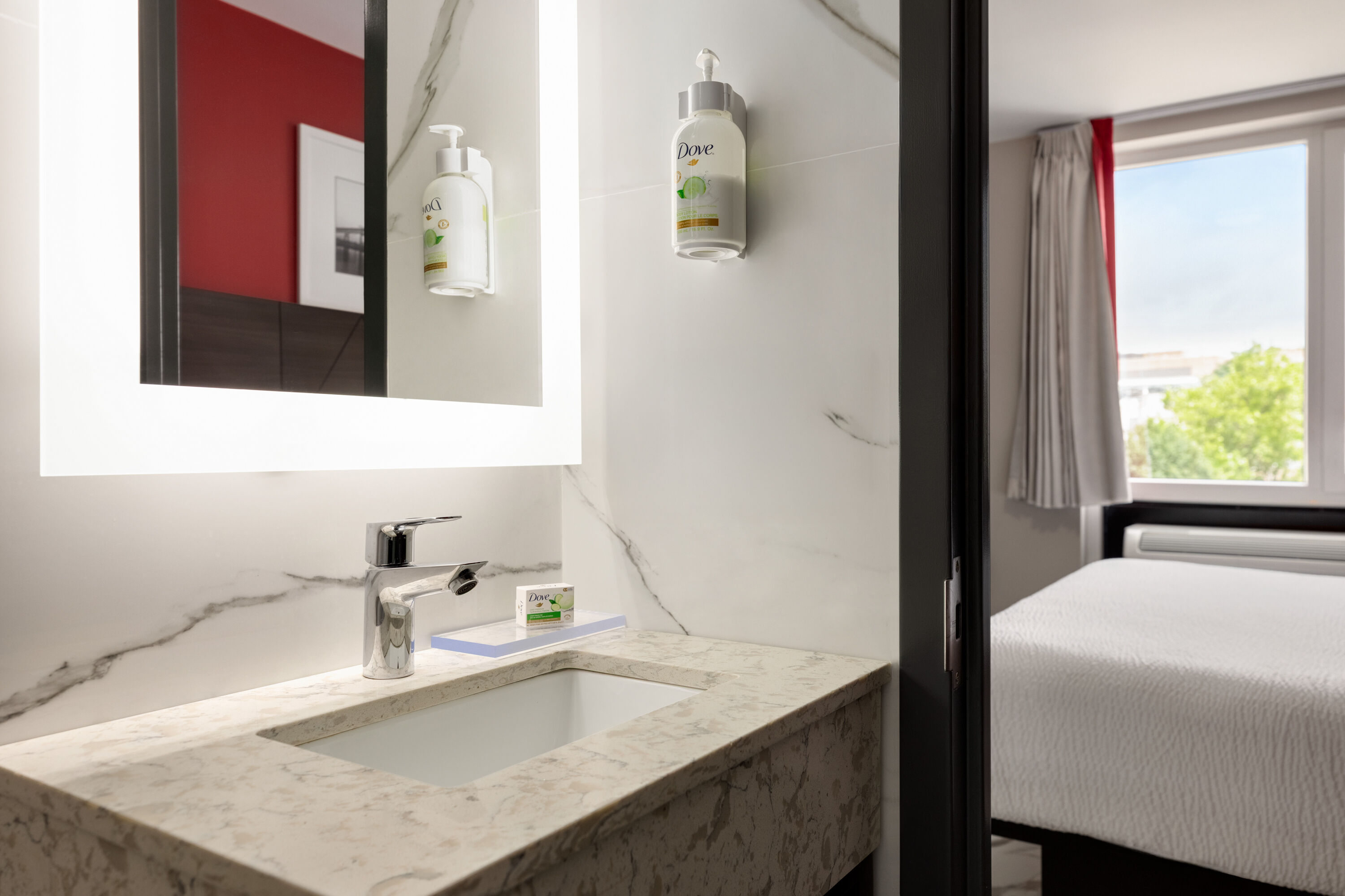 Guest room bath at the Ramada by Wyndham Brooklyn Empire Blvd in Brooklyn, New York