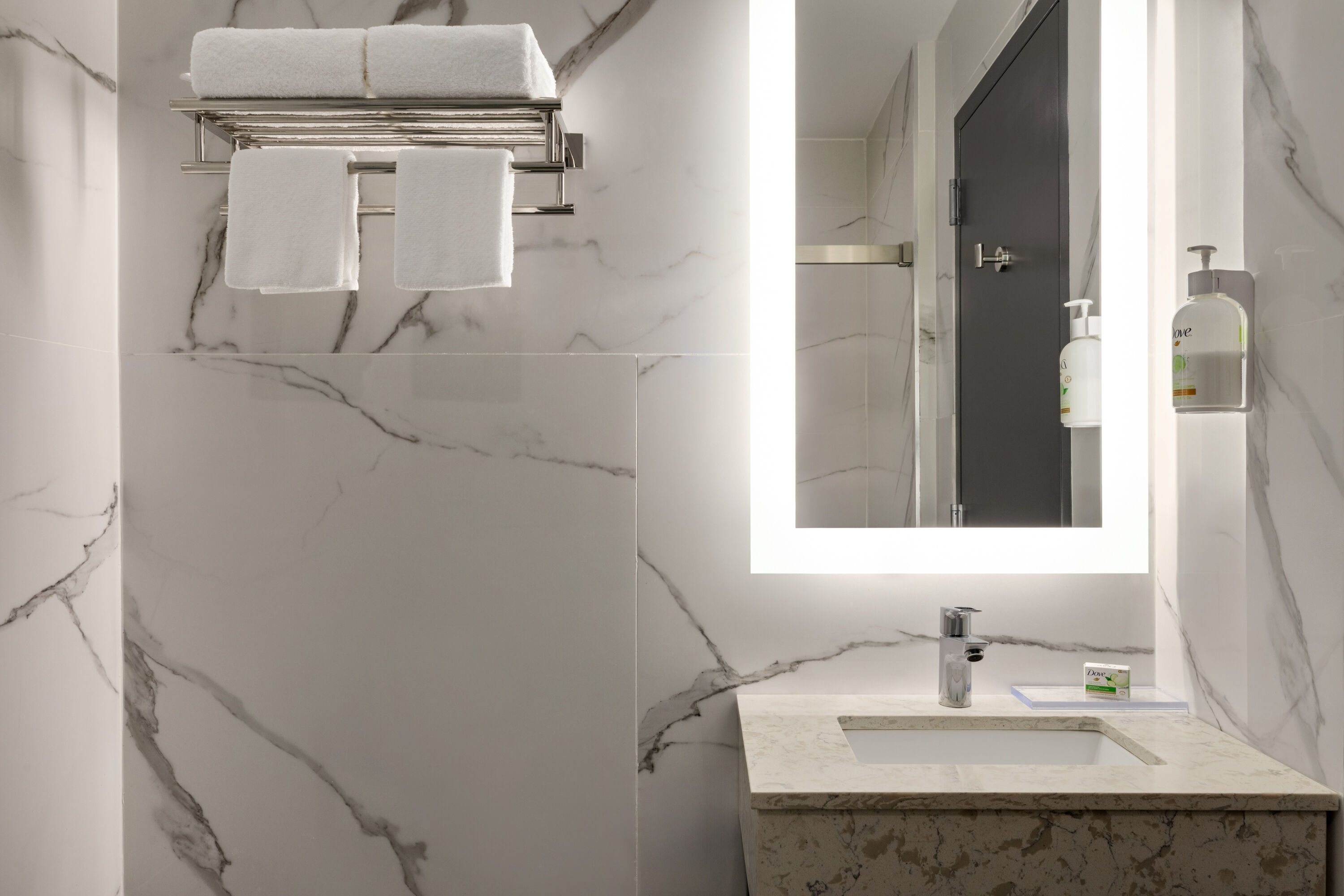 Guest room bath at the Ramada by Wyndham Brooklyn Empire Blvd in Brooklyn, New York