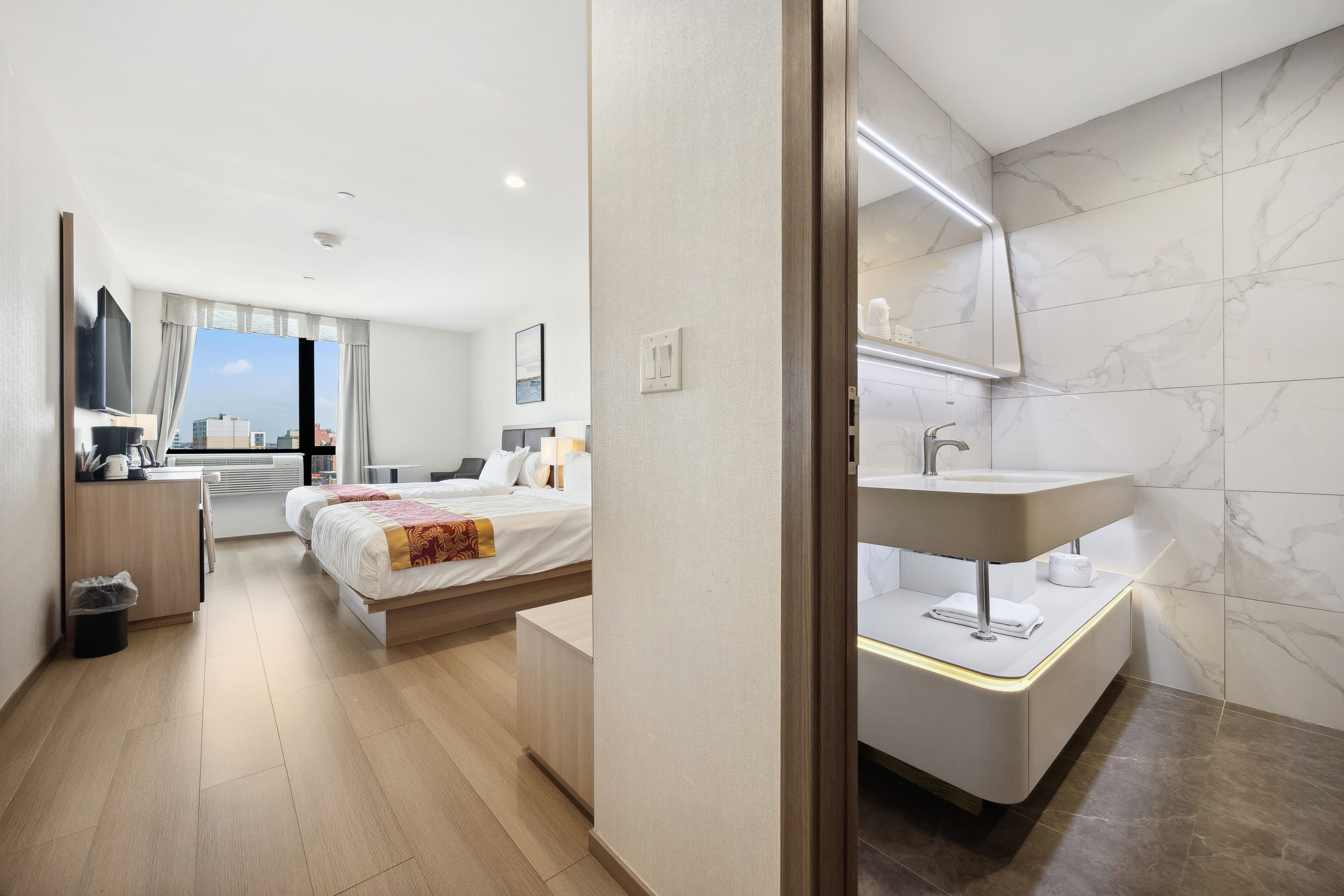 Guest room at the Ramada by Wyndham Flushing Queens in Flushing, New York