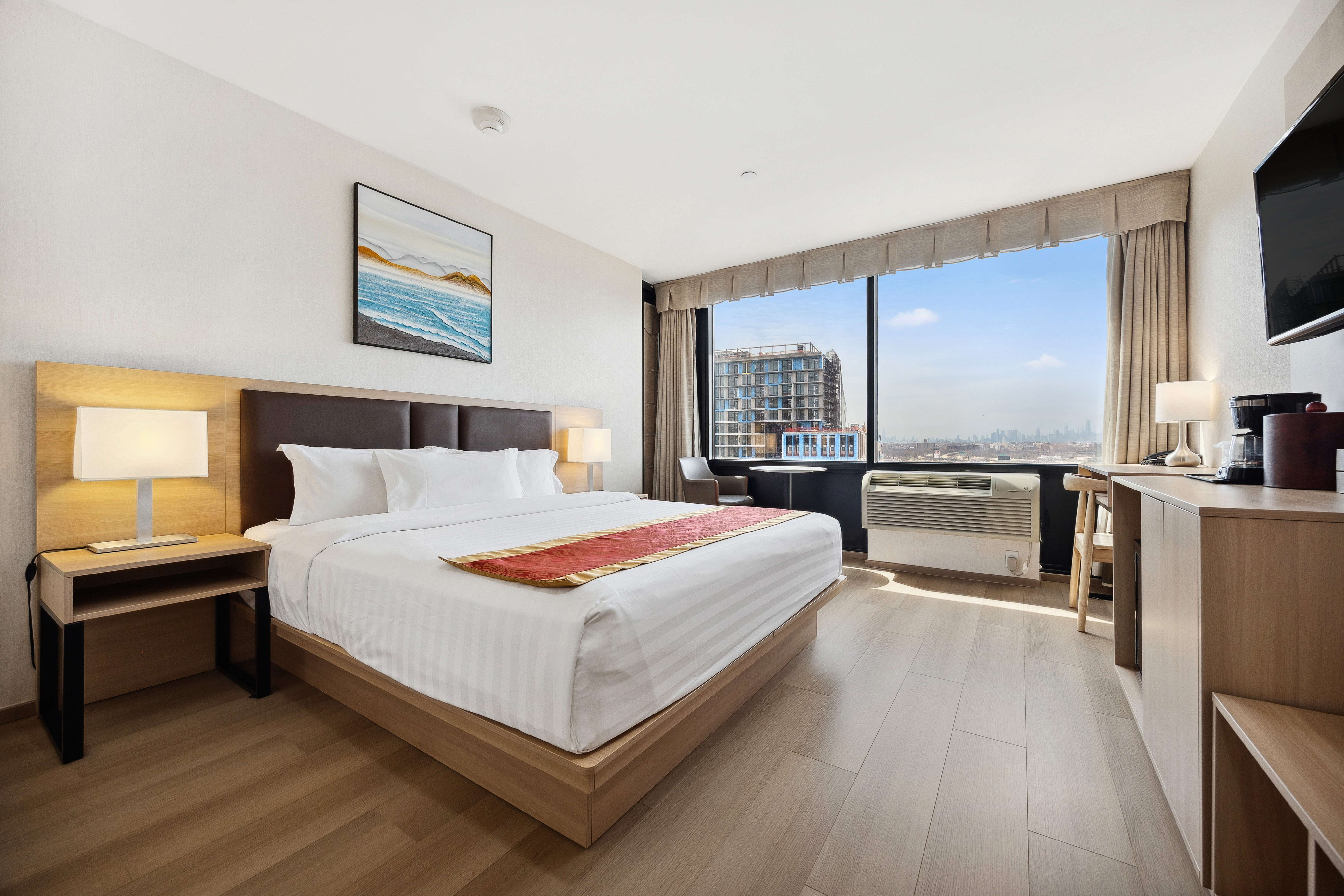 Guest room at the Ramada by Wyndham Flushing Queens in Flushing, New York