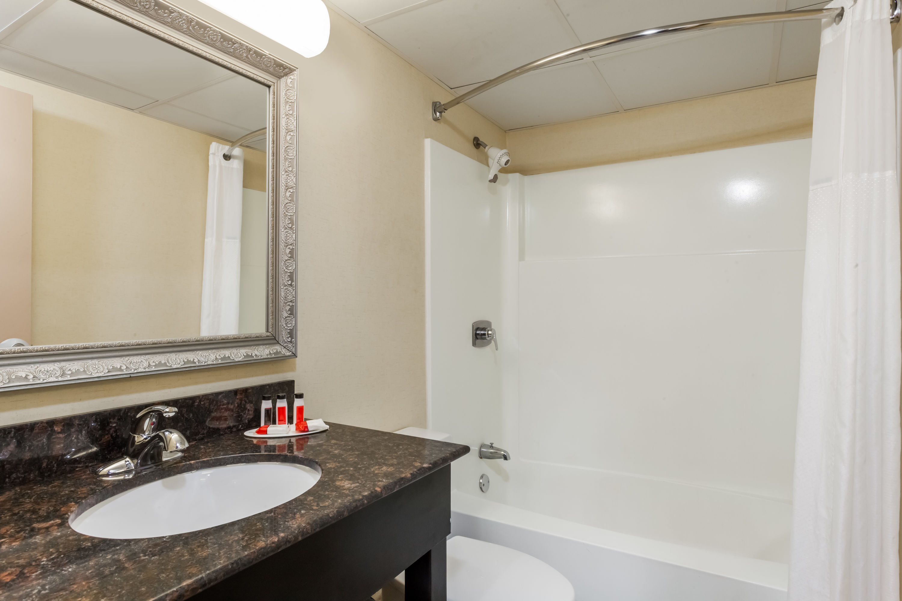 Guest room at the Ramada by Wyndham Newburgh/West Point in Newburgh, New York