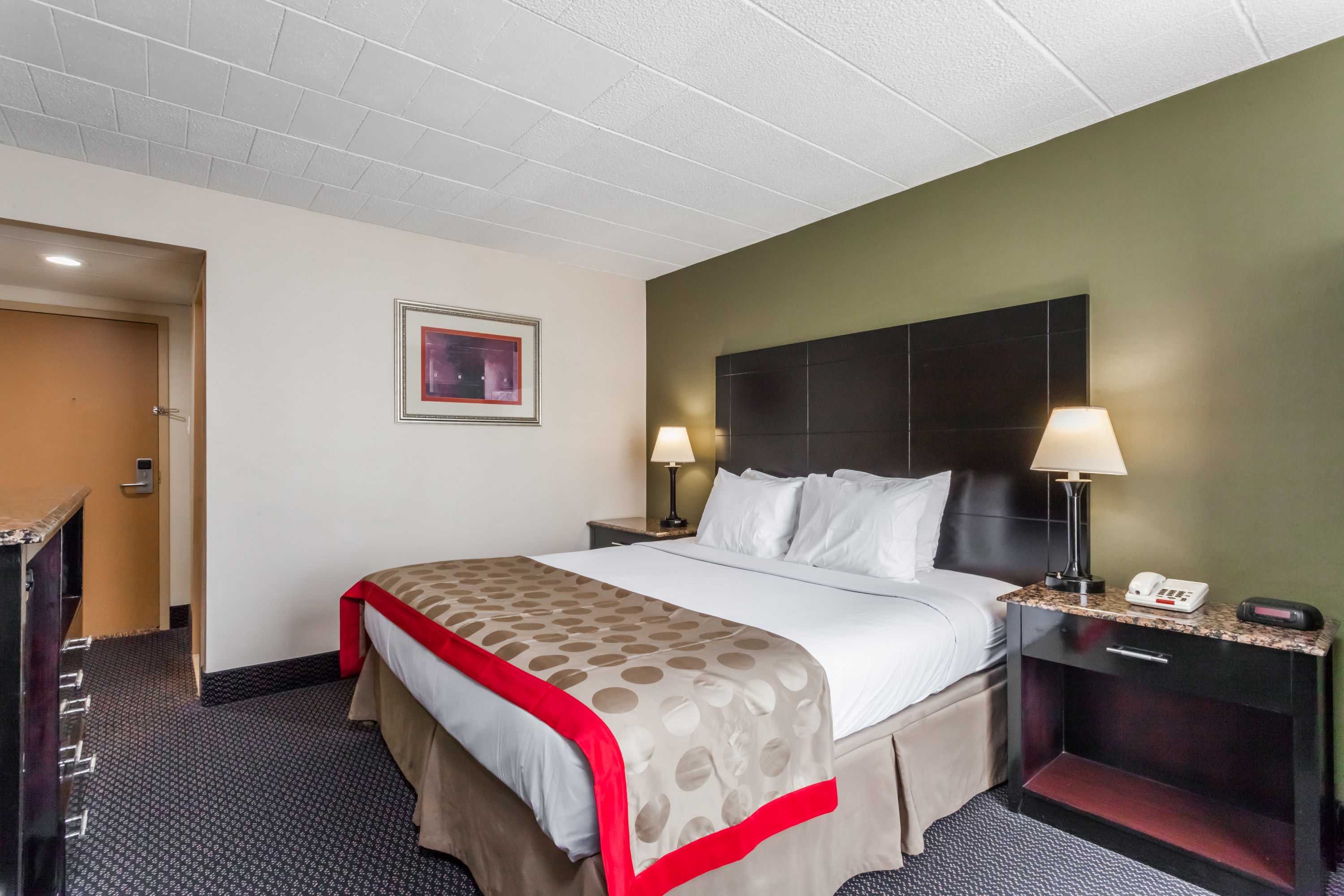 Guest room at the Ramada by Wyndham Newburgh/West Point in Newburgh, New York