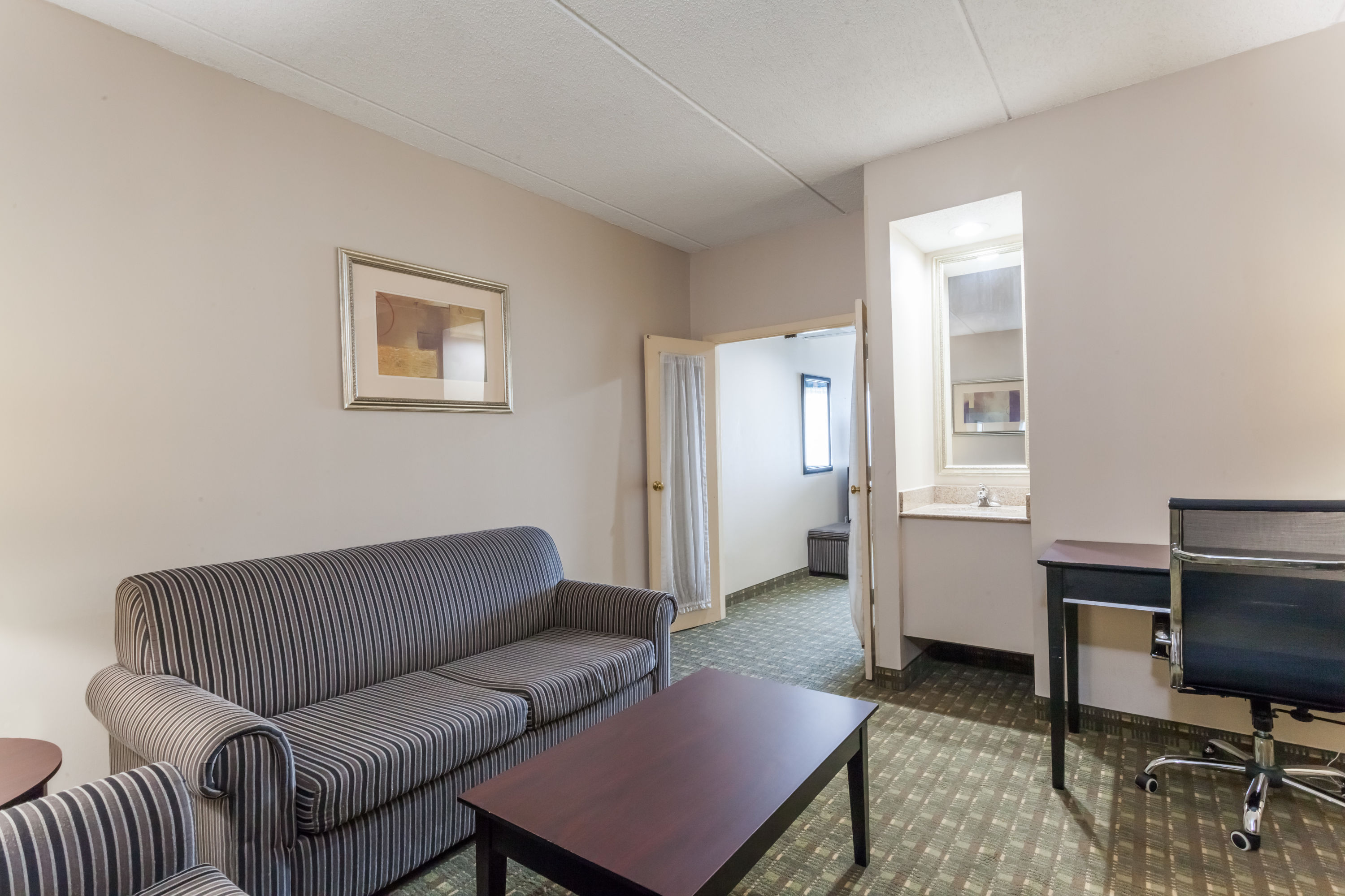 Guest room at the Ramada by Wyndham Newburgh/West Point in Newburgh, New York