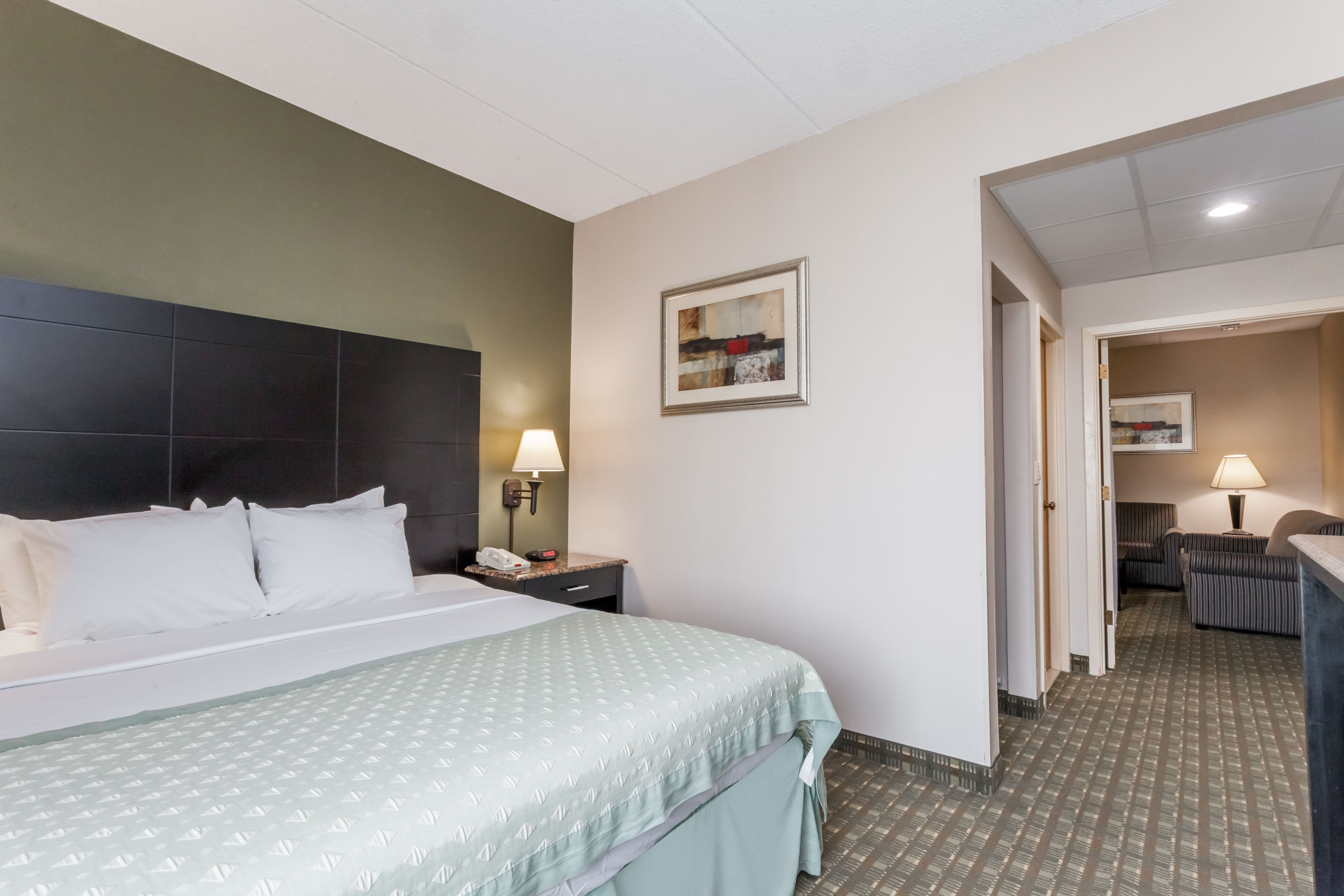 Guest room at the Ramada by Wyndham Newburgh/West Point in Newburgh, New York