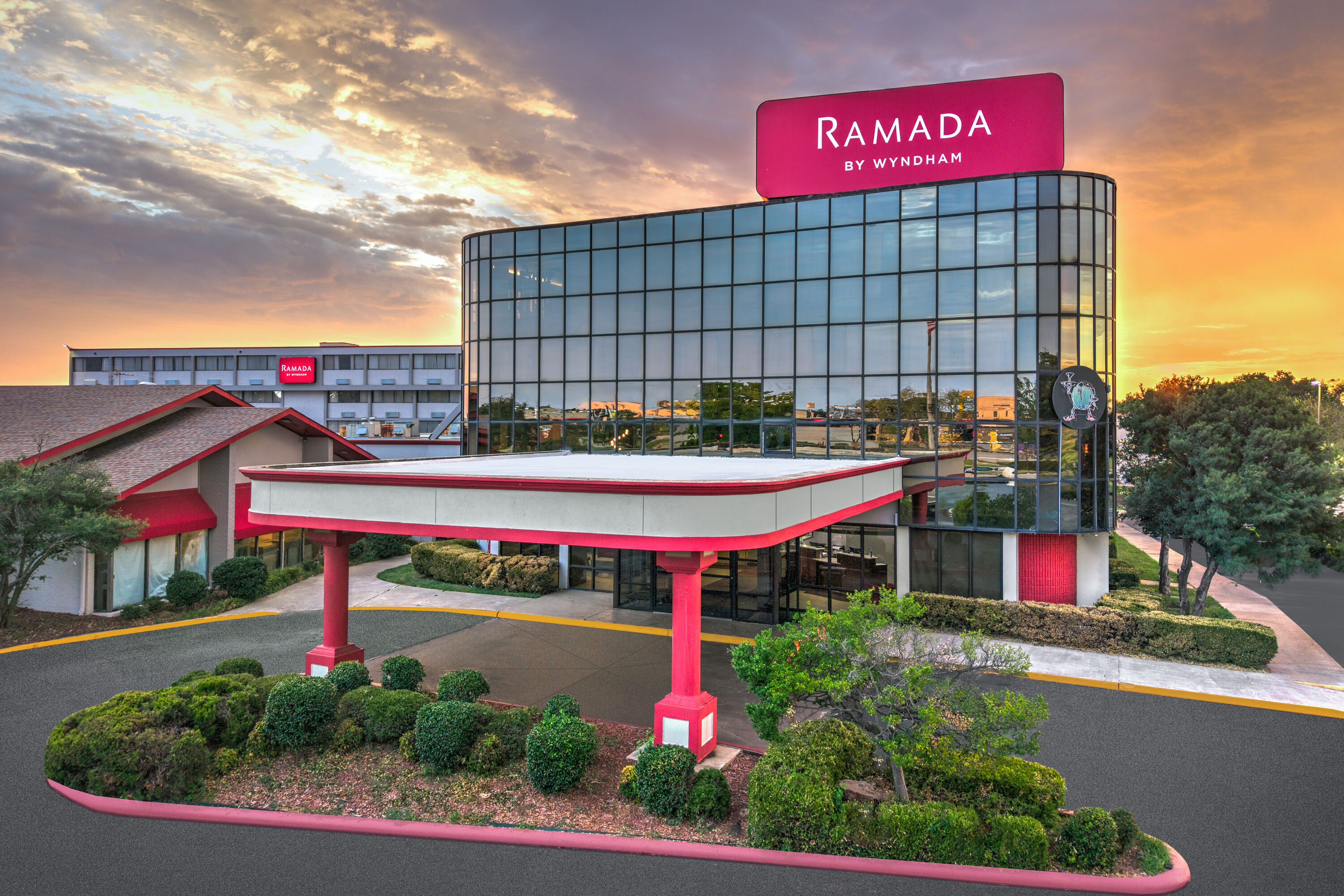 Exterior Dusk Image of Ramada by Wyndham Tulsa/Broken Arrow hotel in Broken Arrow, Oklahoma