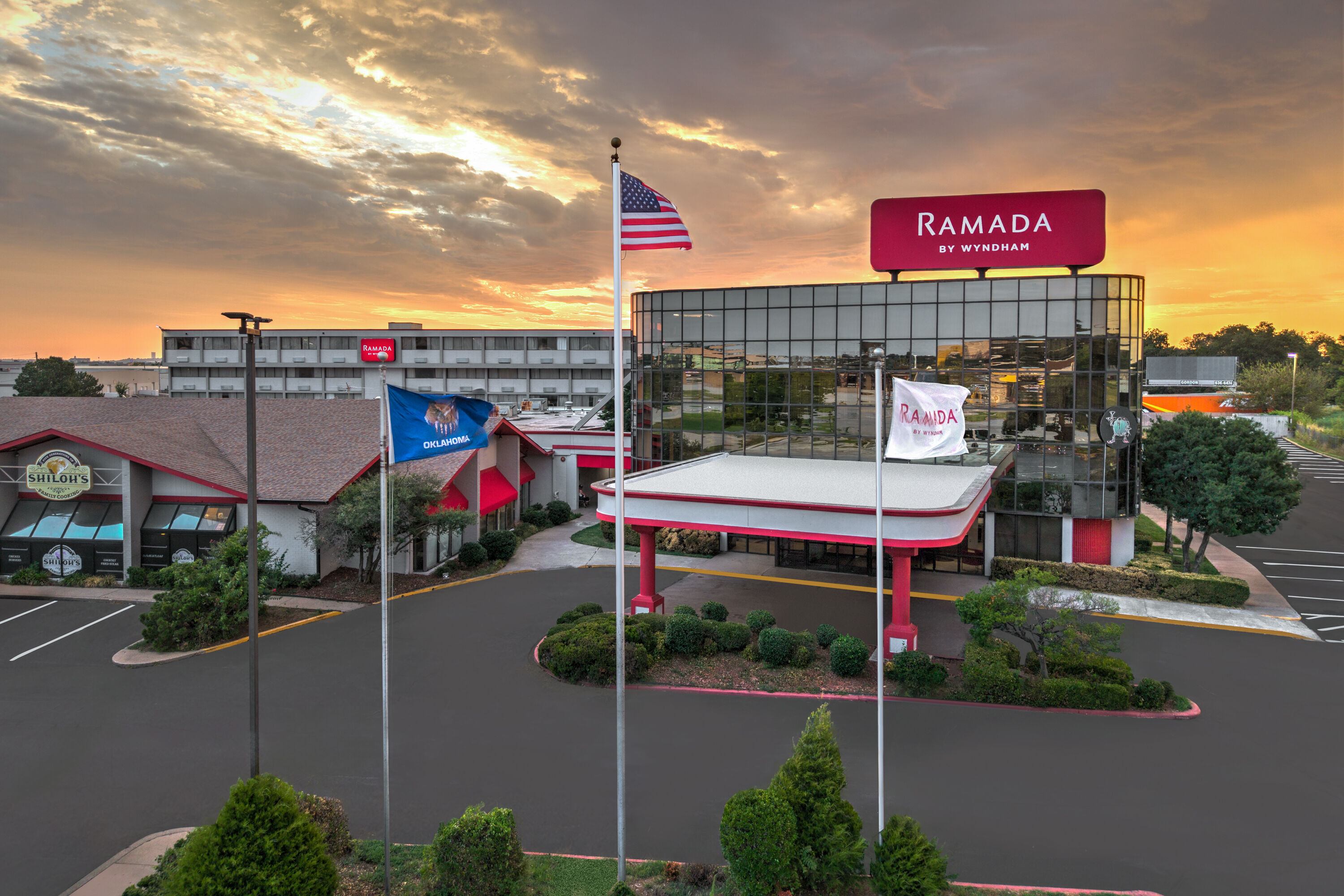 Exterior Dusk Image of Ramada by Wyndham Tulsa/Broken Arrow hotel in Broken Arrow, Oklahoma