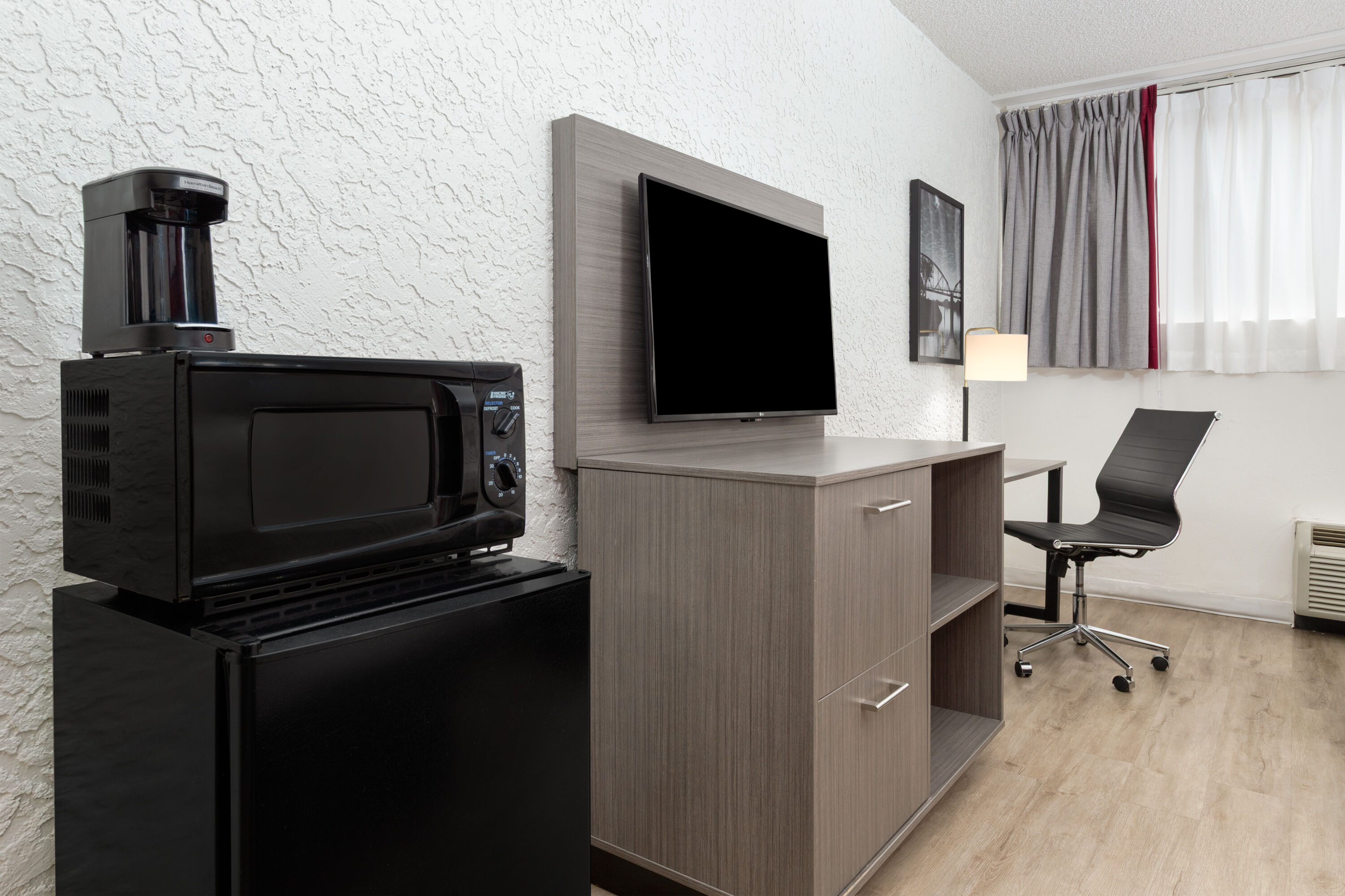Guest room at the Ramada by Wyndham Tulsa/Broken Arrow in Broken Arrow, Oklahoma