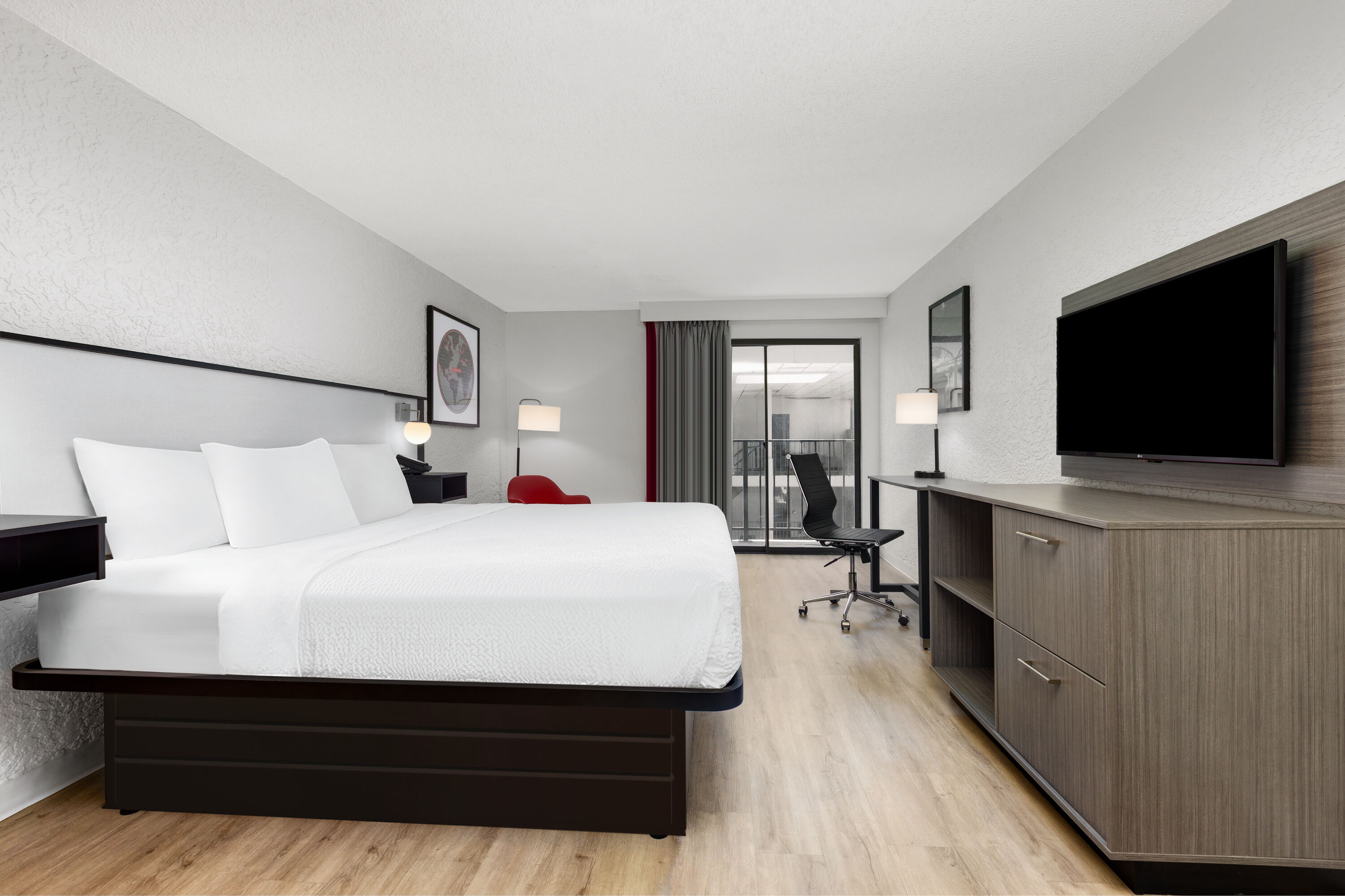 Guest room at the Ramada by Wyndham Tulsa/Broken Arrow in Broken Arrow, Oklahoma