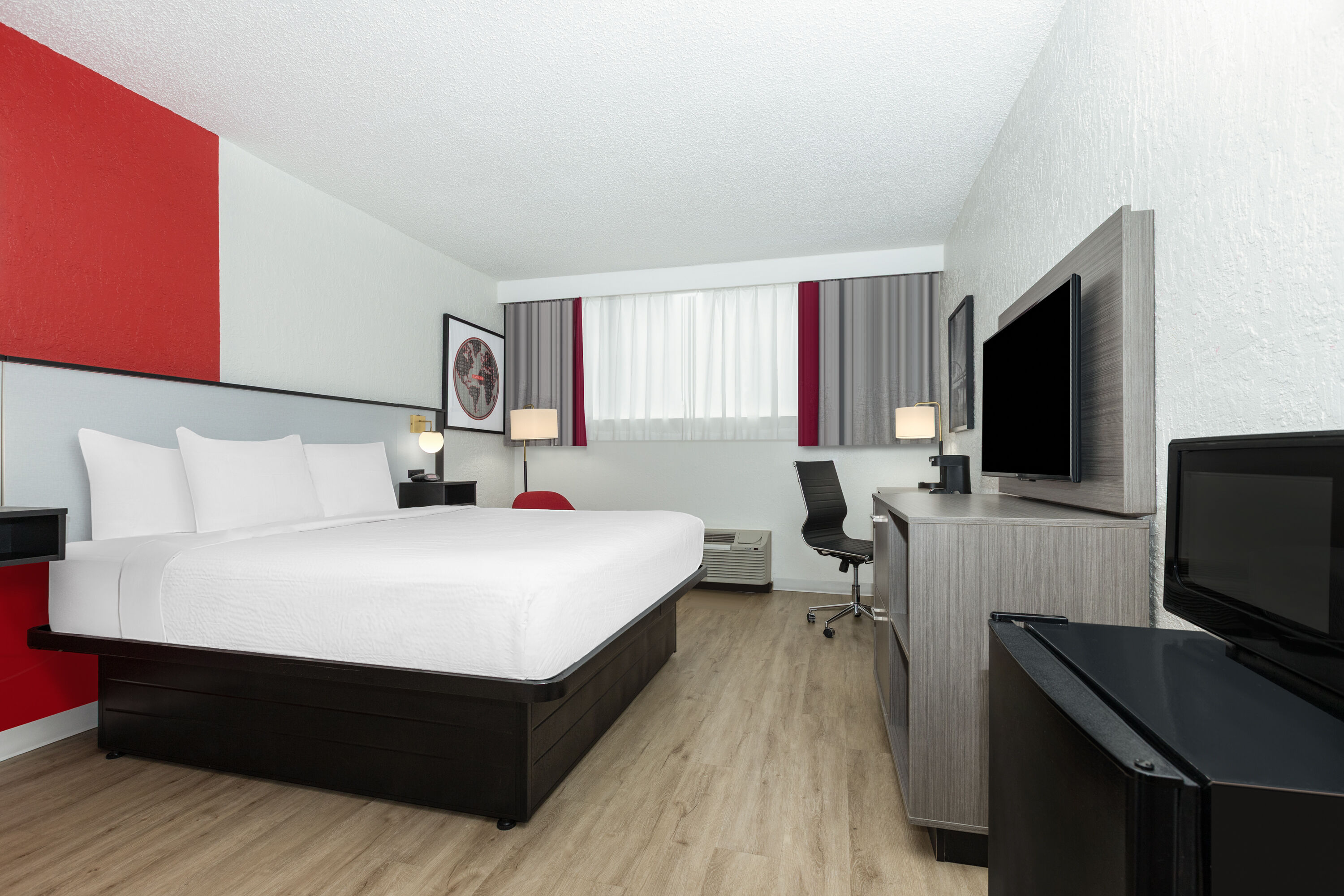 Guest room at the Ramada by Wyndham Tulsa/Broken Arrow in Broken Arrow, Oklahoma