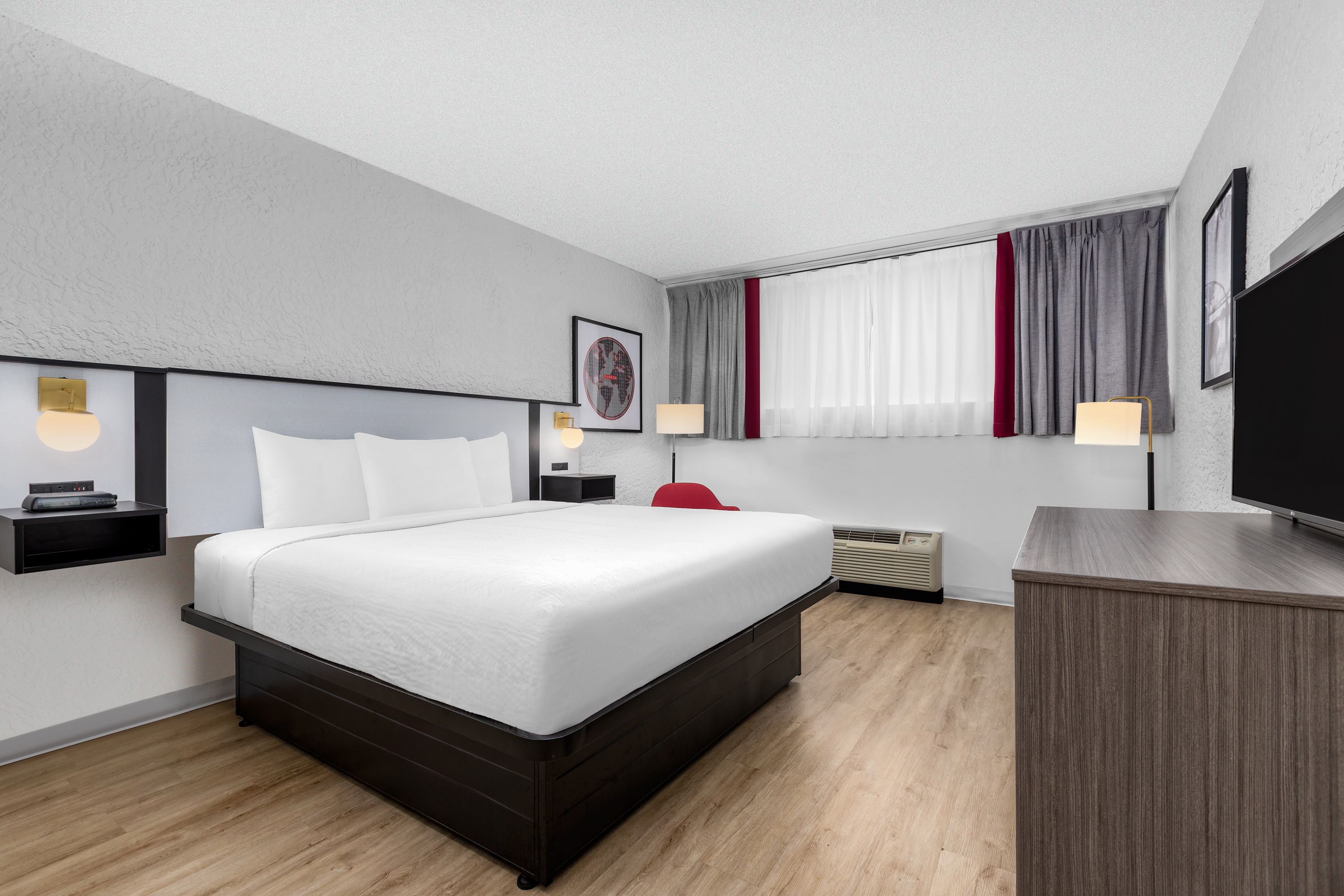 Guest room at the Ramada by Wyndham Tulsa/Broken Arrow in Broken Arrow, Oklahoma