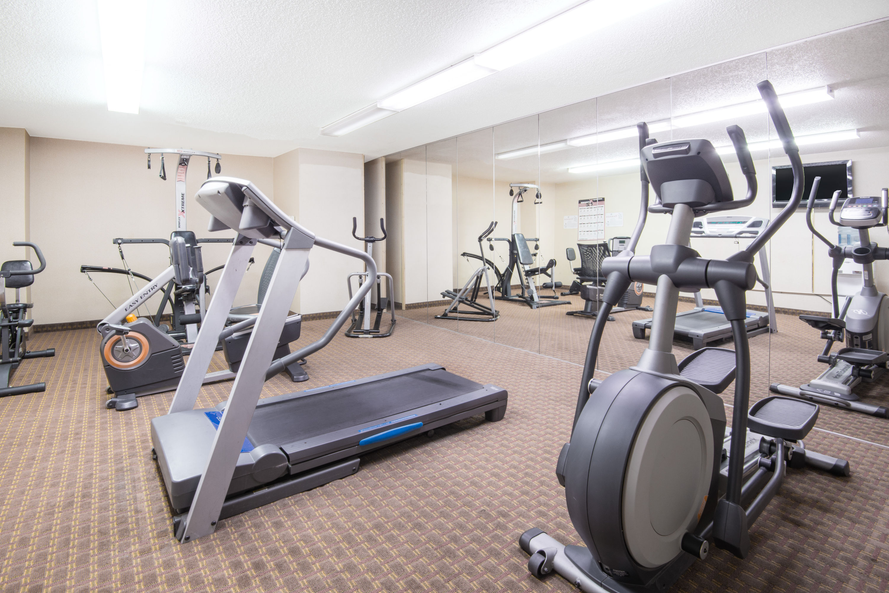 Fitness room at Ramada by Wyndham Enid in Enid, Oklahoma