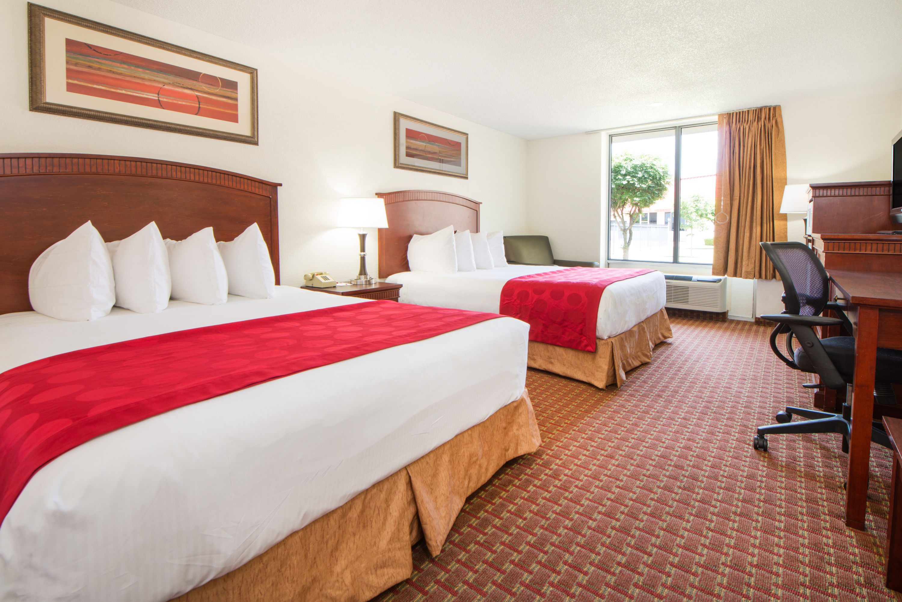 Guest room at the Ramada by Wyndham Enid in Enid, Oklahoma