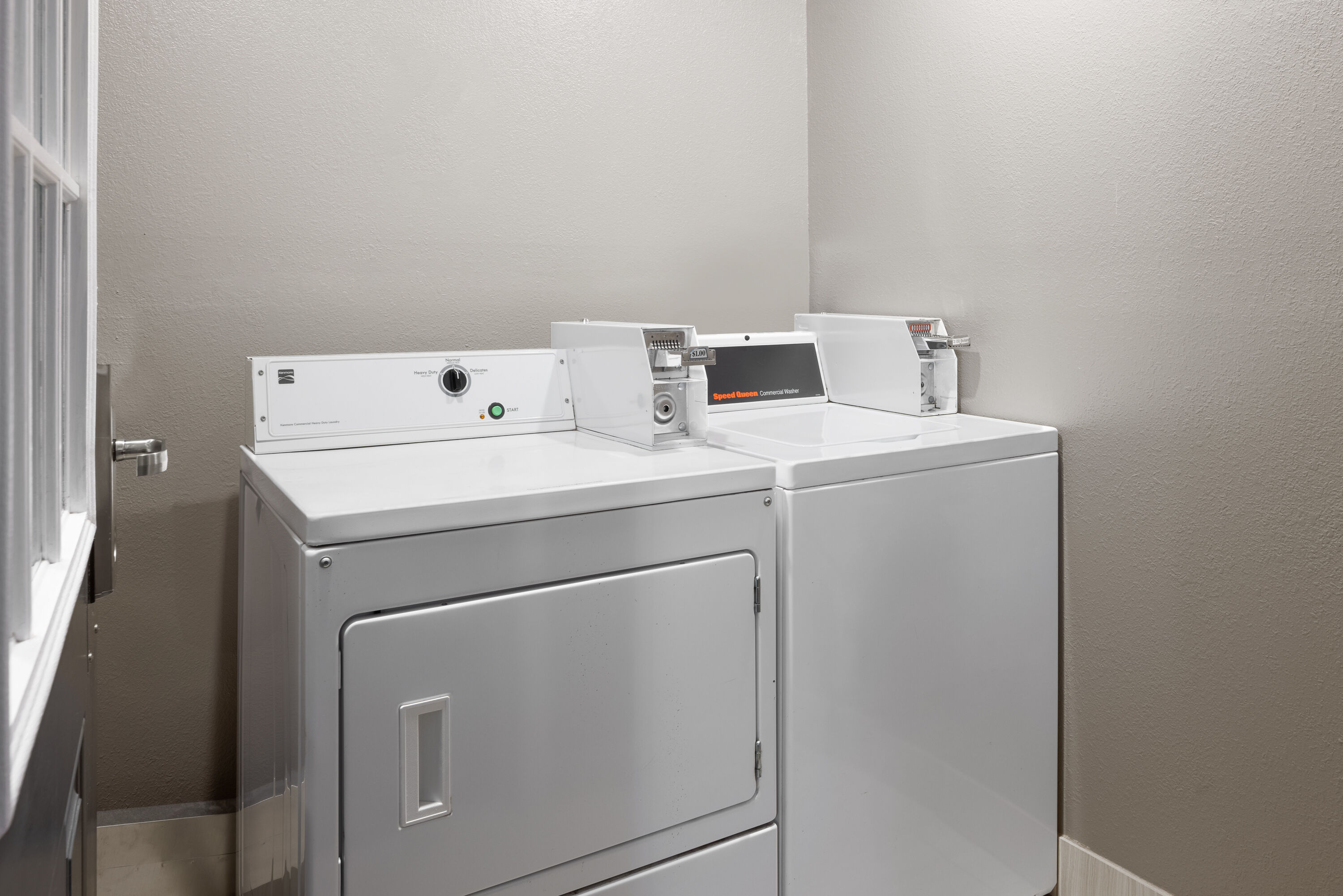 Laundry facilities at Ramada by Wyndham Medford Airport North in Medford, Oregon