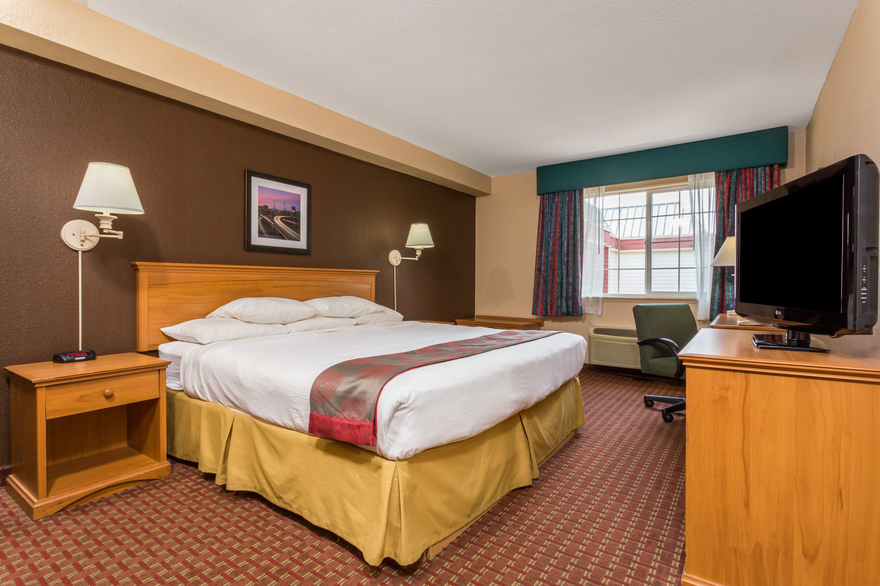 Guest room at the Ramada by Wyndham Portland in Portland, Oregon