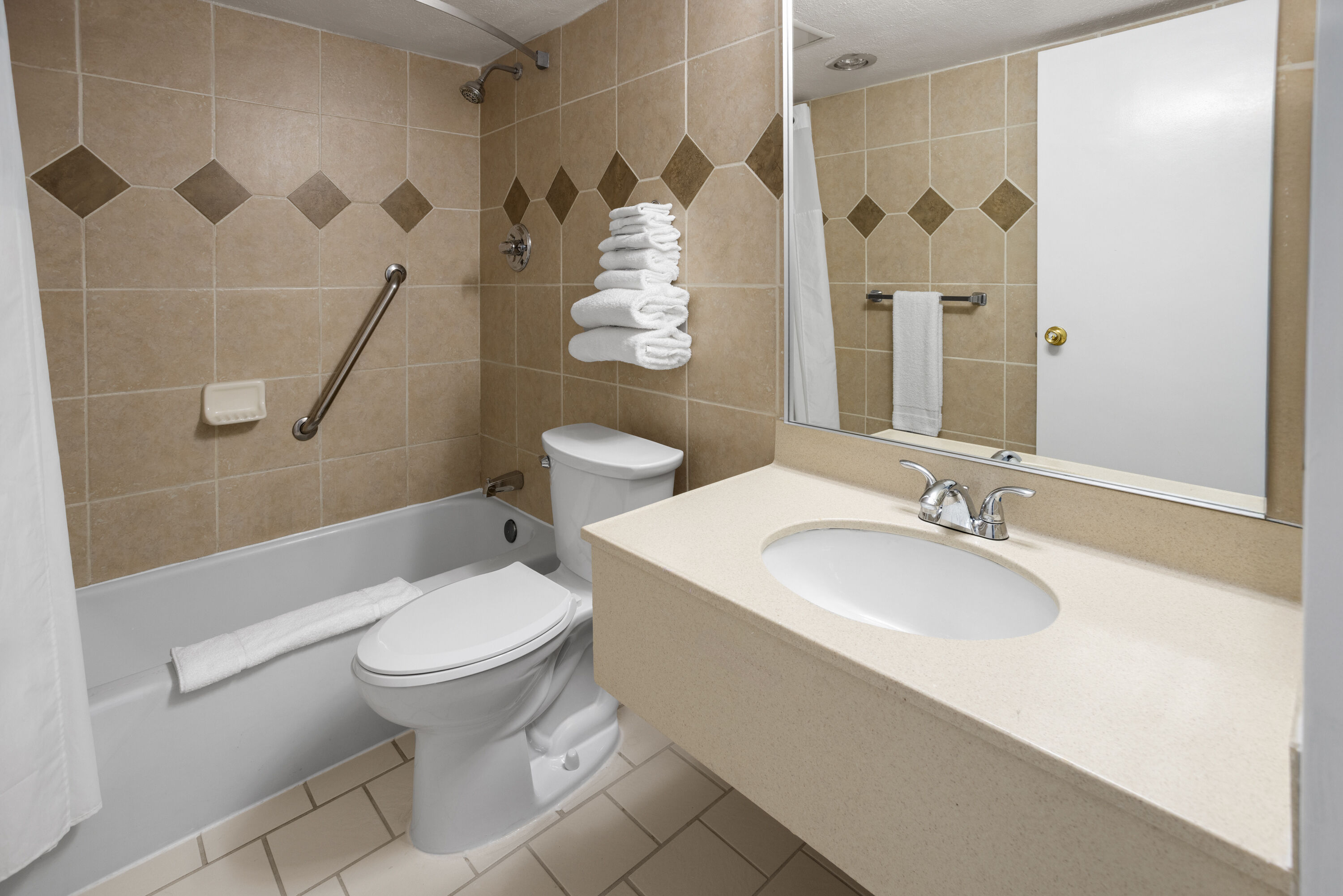 Guest room bath at the Ramada by Wyndham Butler/Tesla Biohealing Resort in Butler, Pennsylvania