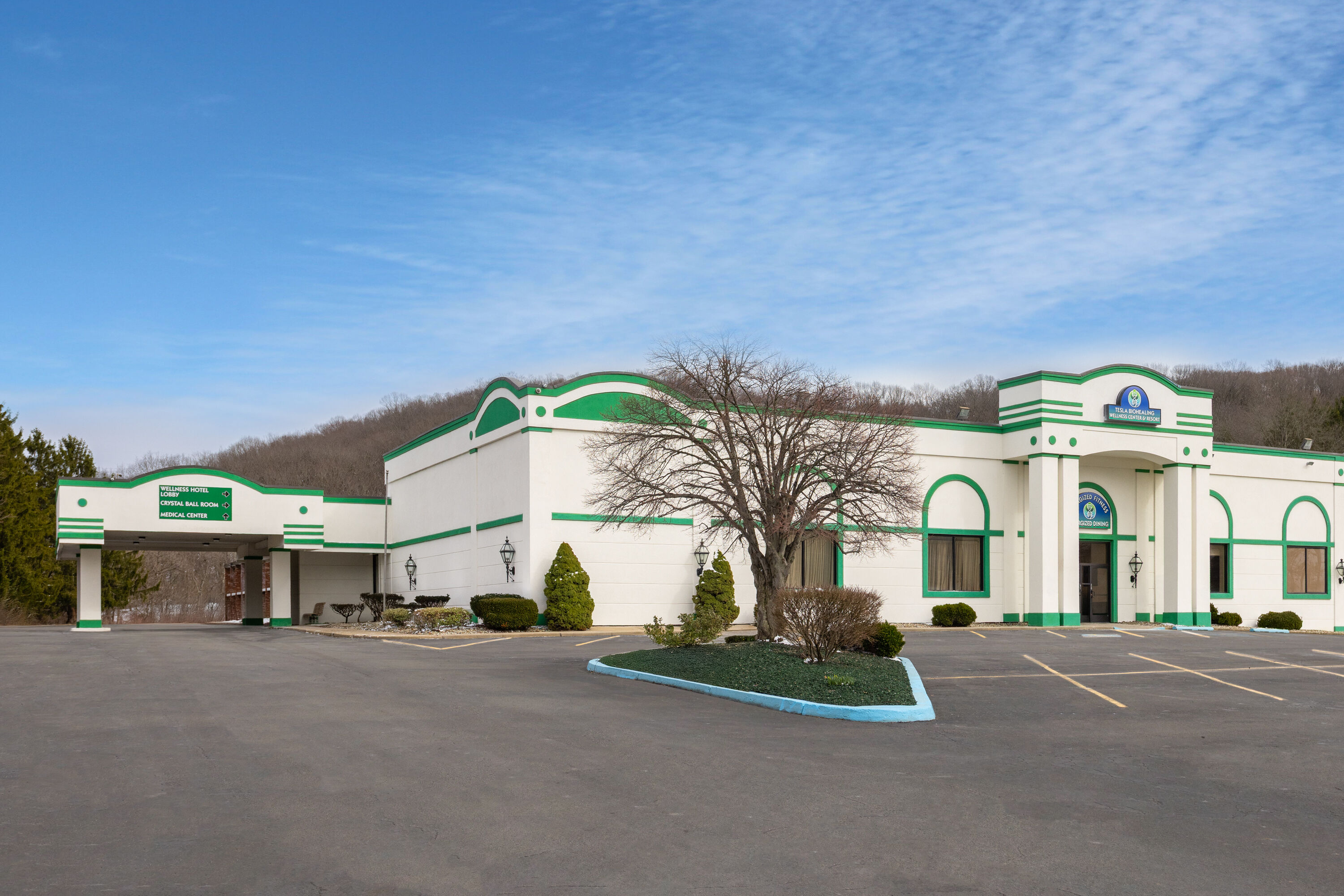 Exterior Day Image of Ramada by Wyndham Butler/Tesla Biohealing Resort hotel in Butler, Pennsylvania