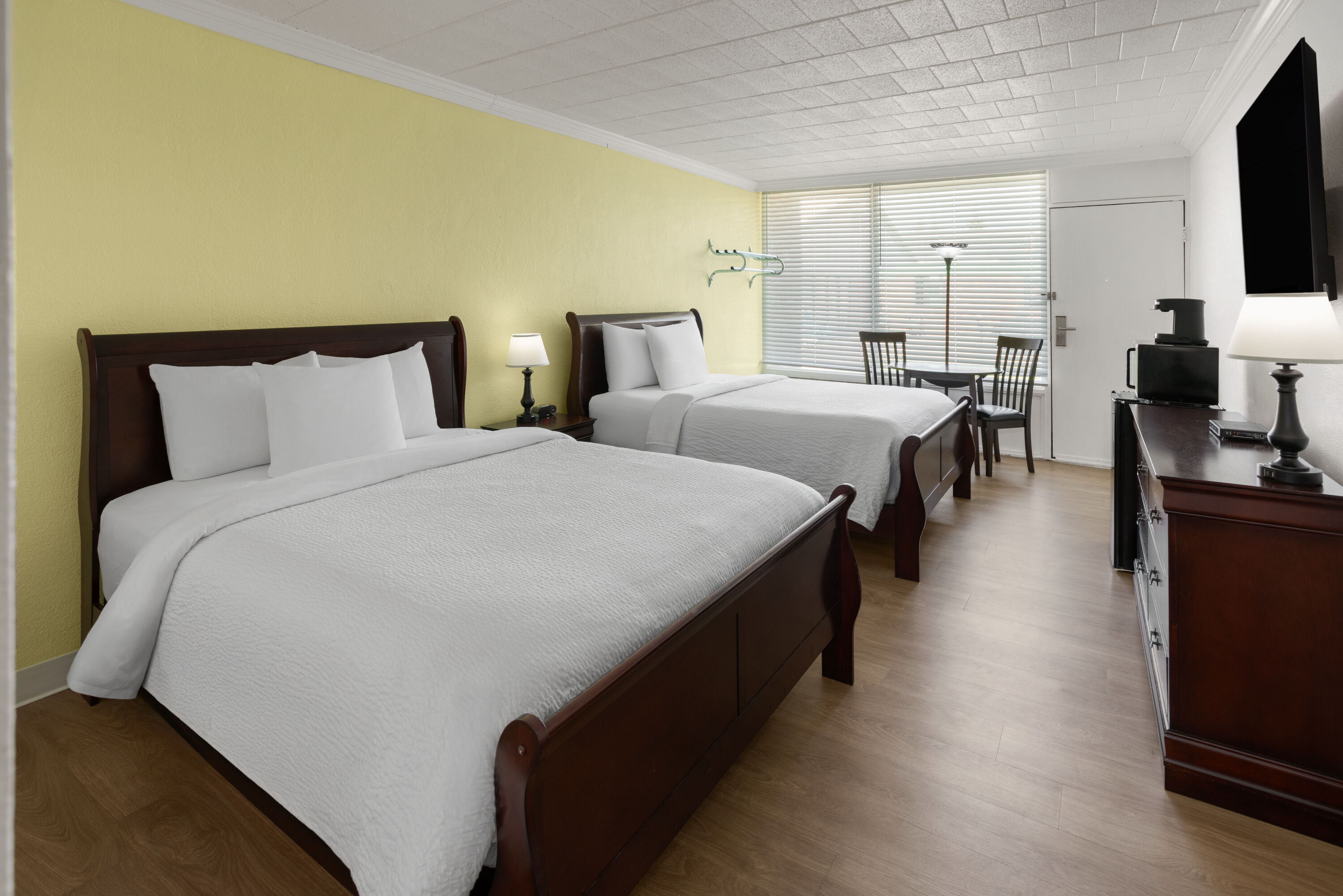 Guest room at the Ramada by Wyndham Butler/Tesla Biohealing Resort in Butler, Pennsylvania