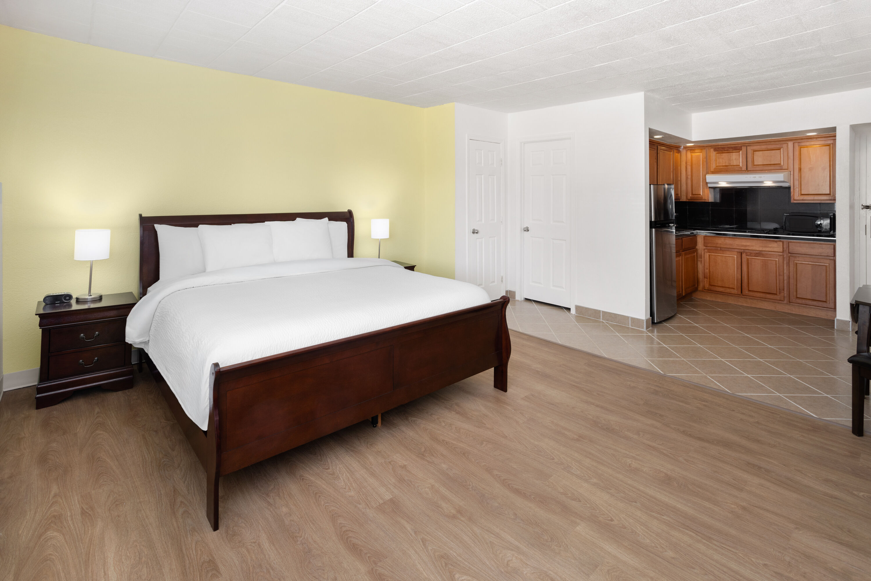 Guest room at the Ramada by Wyndham Butler/Tesla Biohealing Resort in Butler, Pennsylvania