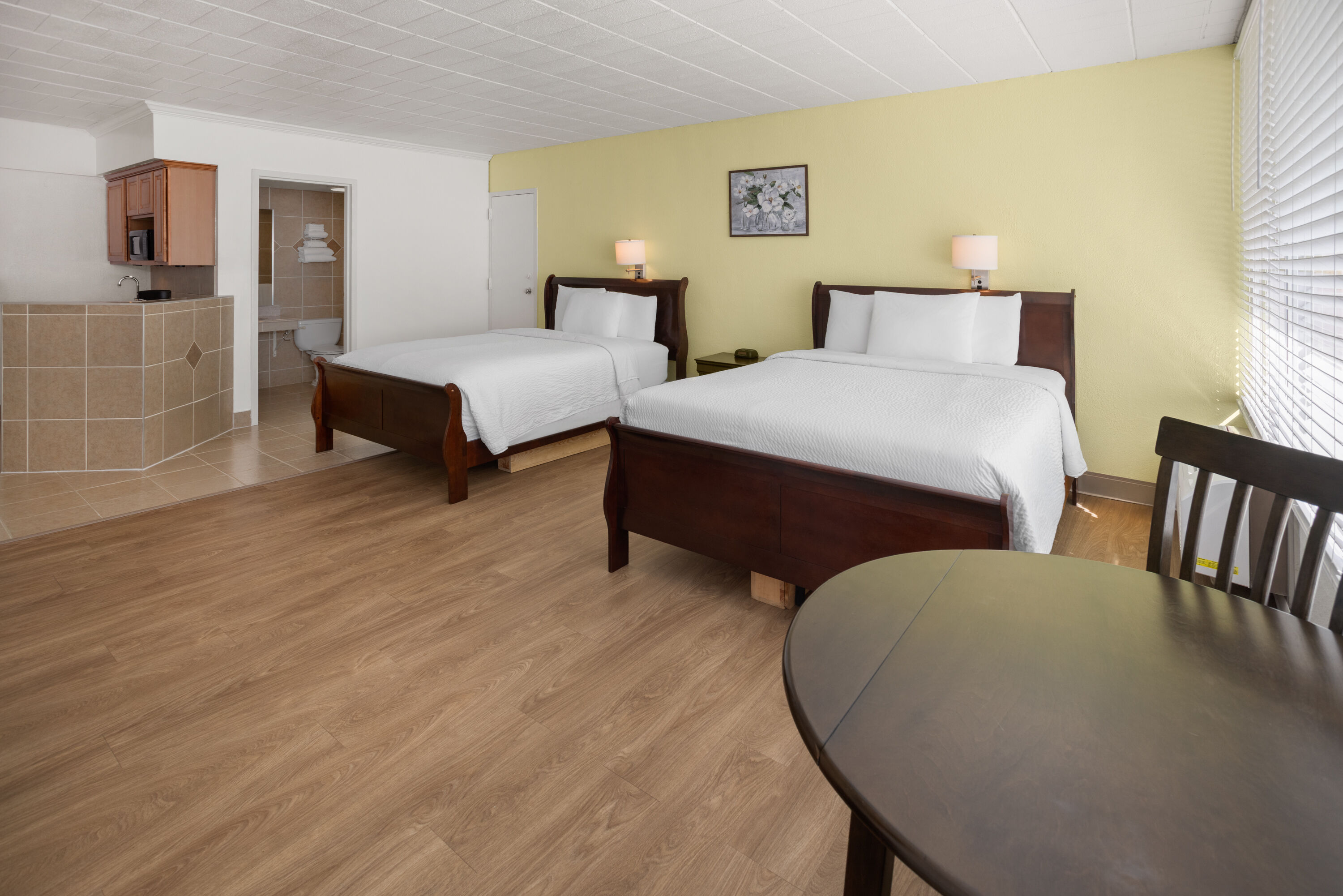 Guest room at the Ramada by Wyndham Butler/Tesla Biohealing Resort in Butler, Pennsylvania