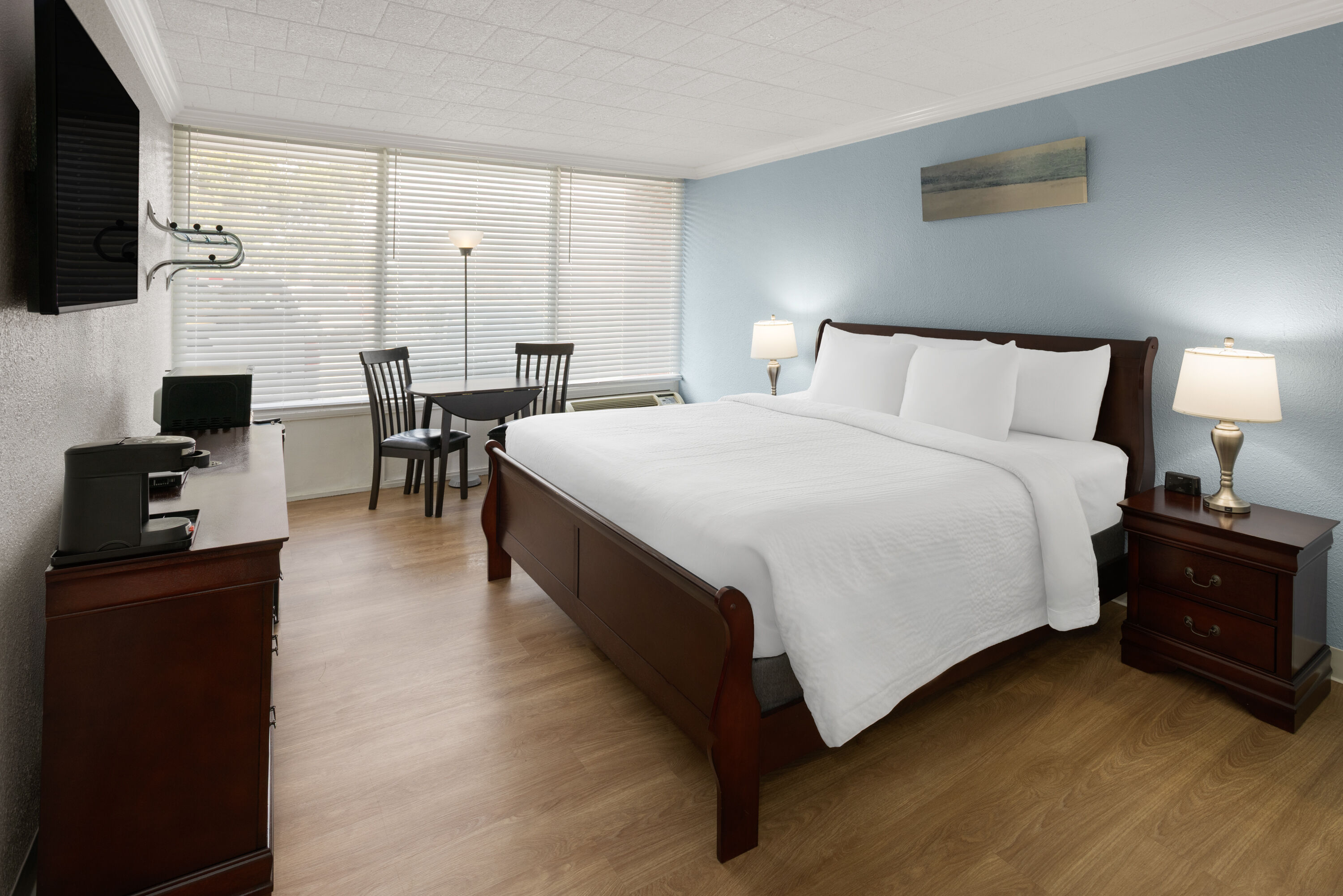 Guest room at the Ramada by Wyndham Butler/Tesla Biohealing Resort in Butler, Pennsylvania