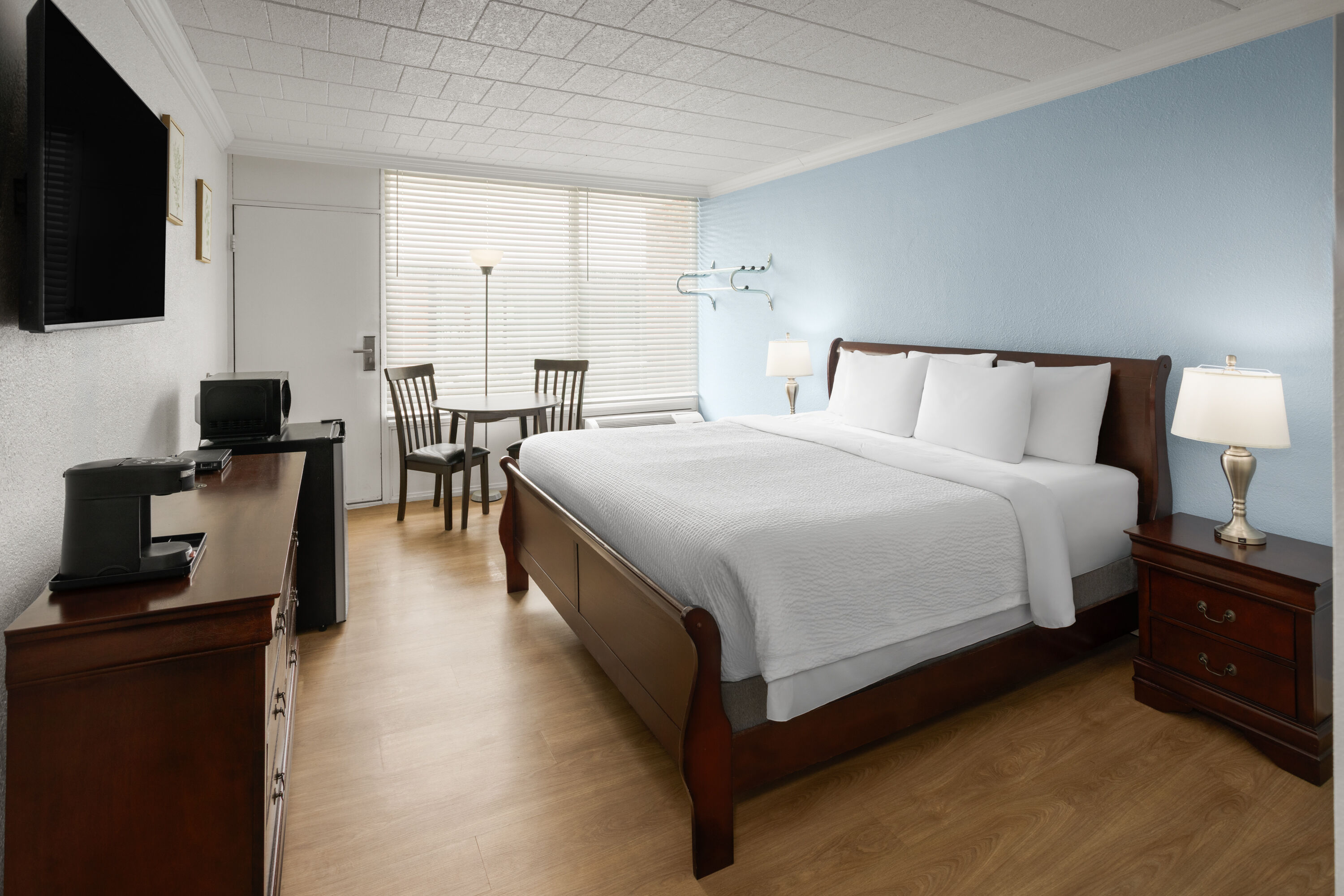 Guest room at the Ramada by Wyndham Butler/Tesla Biohealing Resort in Butler, Pennsylvania