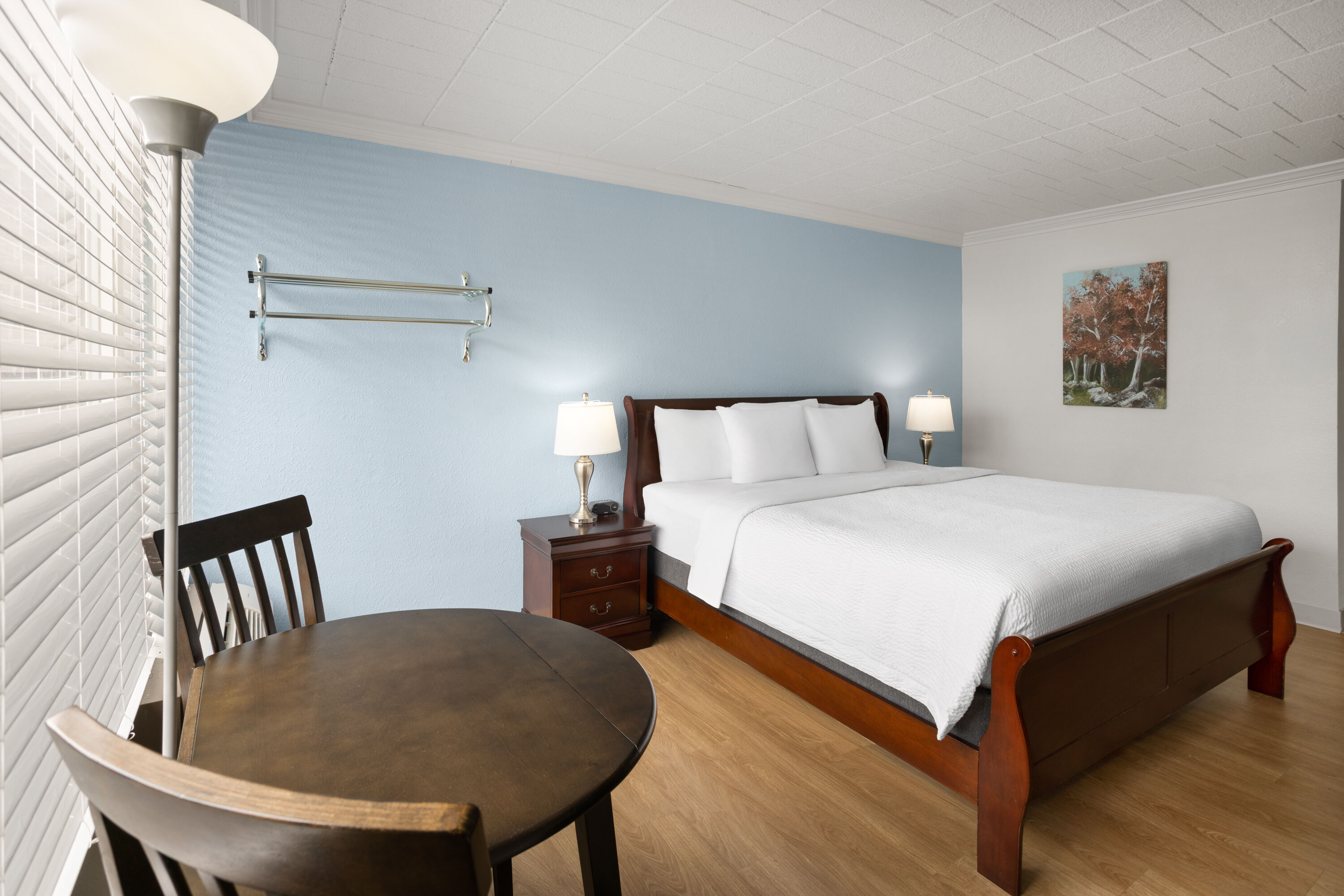Guest room at the Ramada by Wyndham Butler/Tesla Biohealing Resort in Butler, Pennsylvania