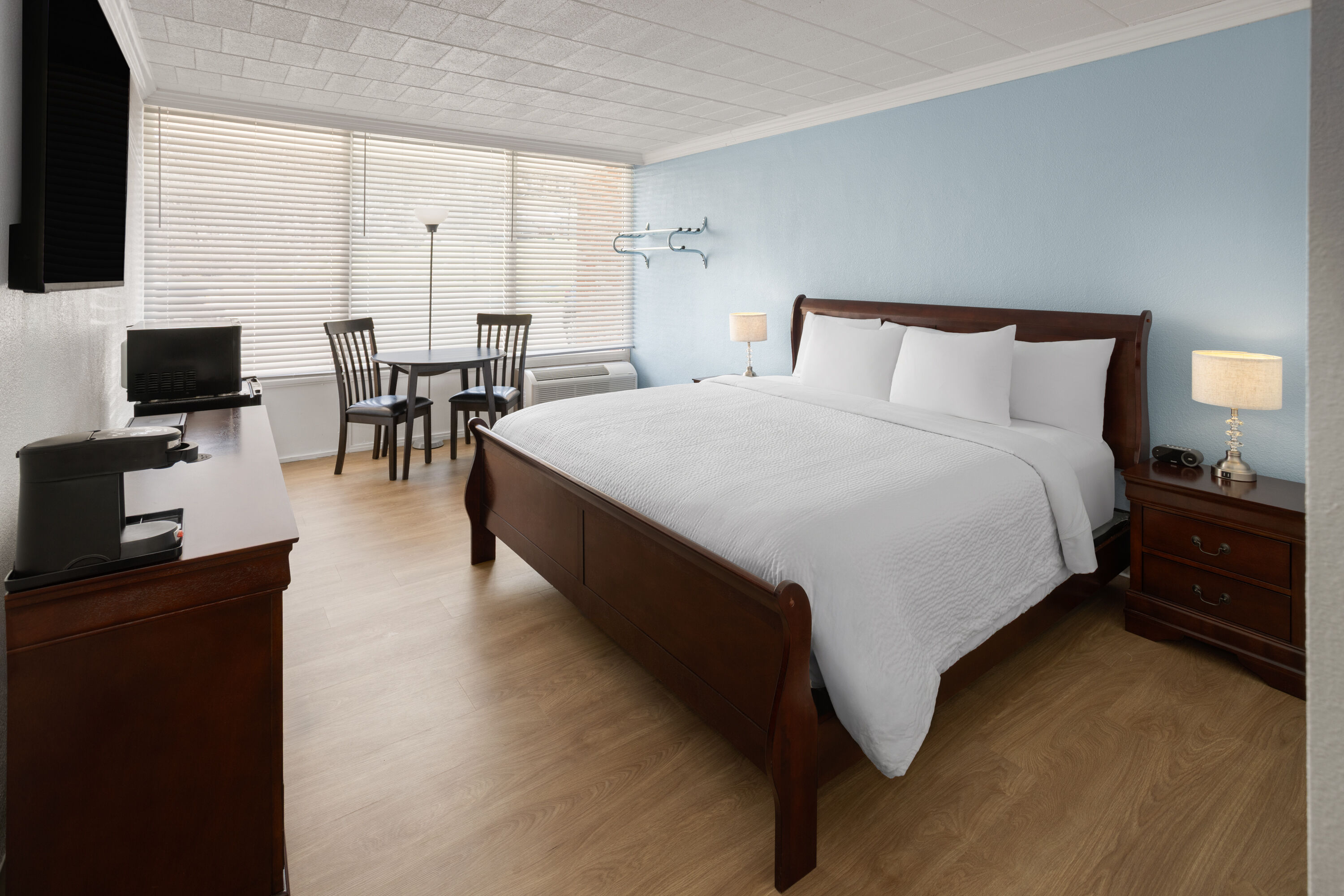 Guest room at the Ramada by Wyndham Butler/Tesla Biohealing Resort in Butler, Pennsylvania