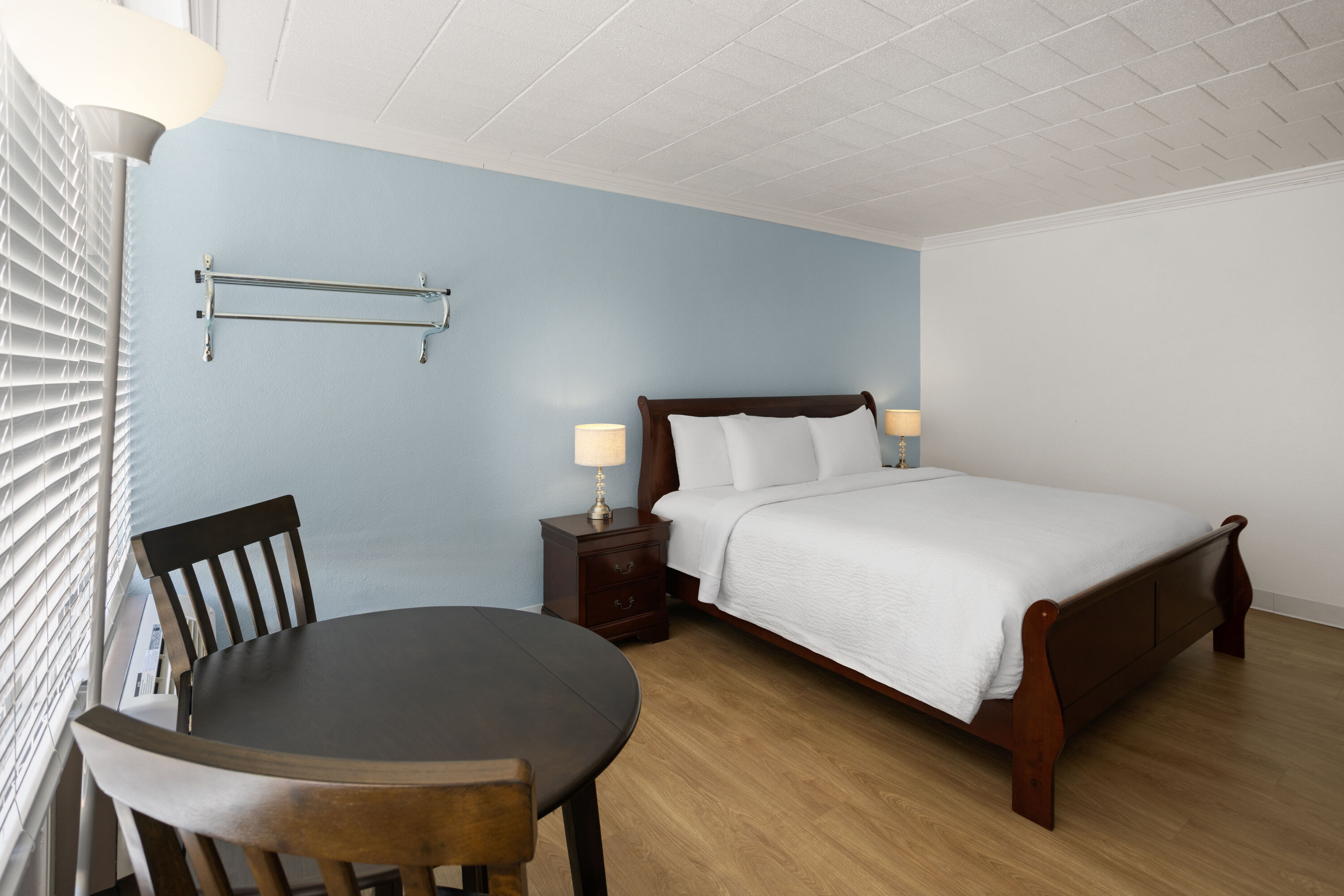 Guest room at the Ramada by Wyndham Butler/Tesla Biohealing Resort in Butler, Pennsylvania