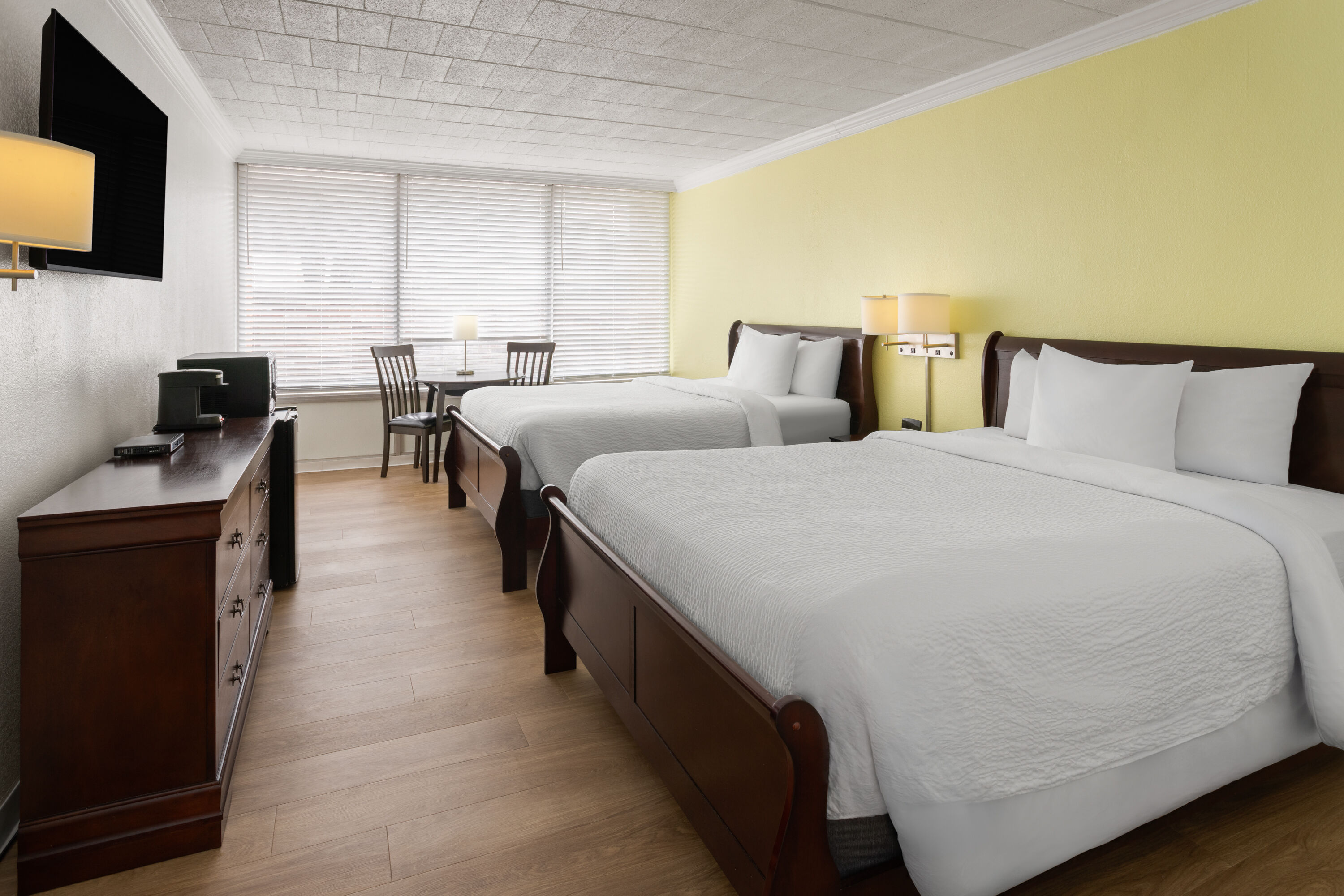 Guest room at the Ramada by Wyndham Butler/Tesla Biohealing Resort in Butler, Pennsylvania
