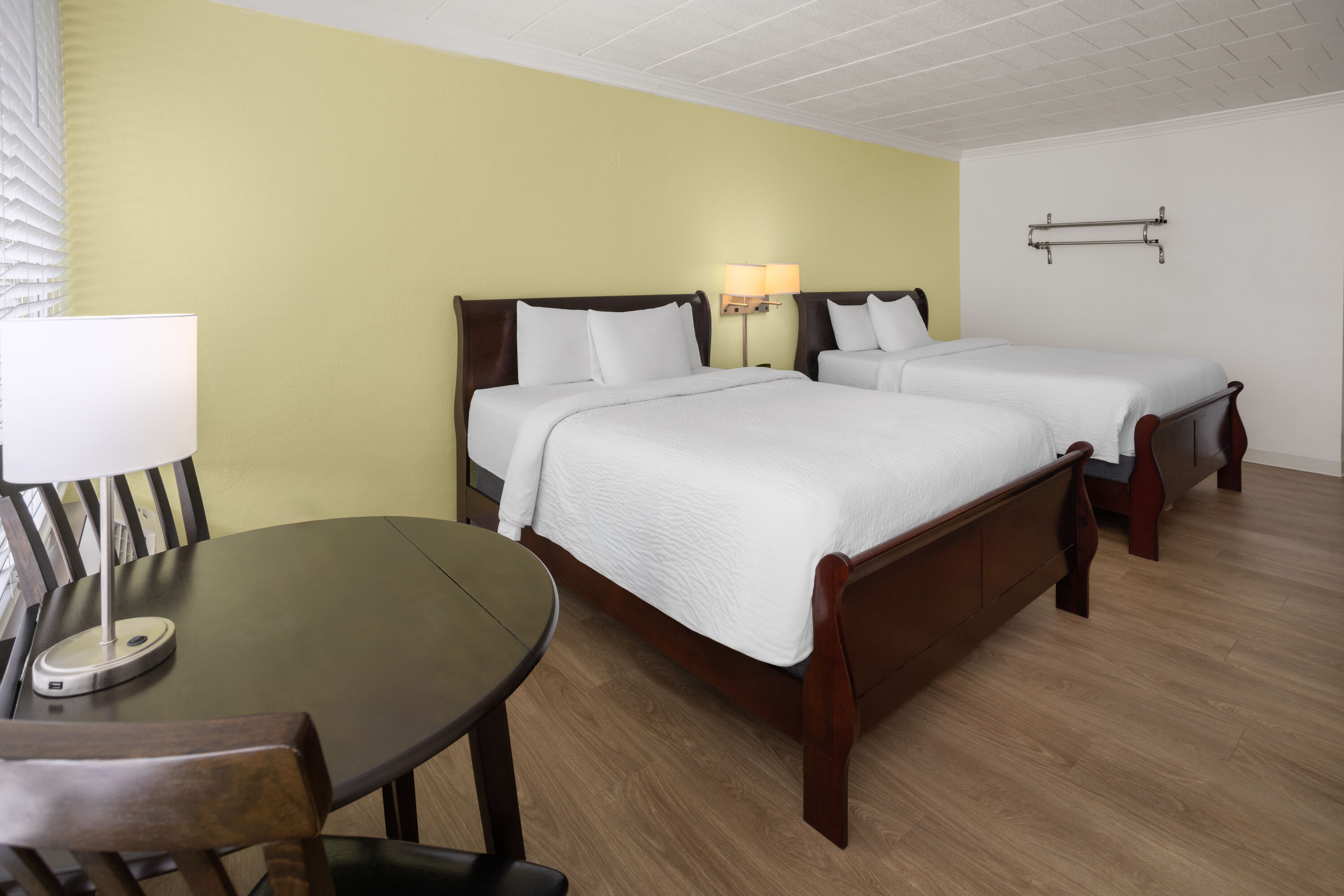 Guest room at the Ramada by Wyndham Butler/Tesla Biohealing Resort in Butler, Pennsylvania