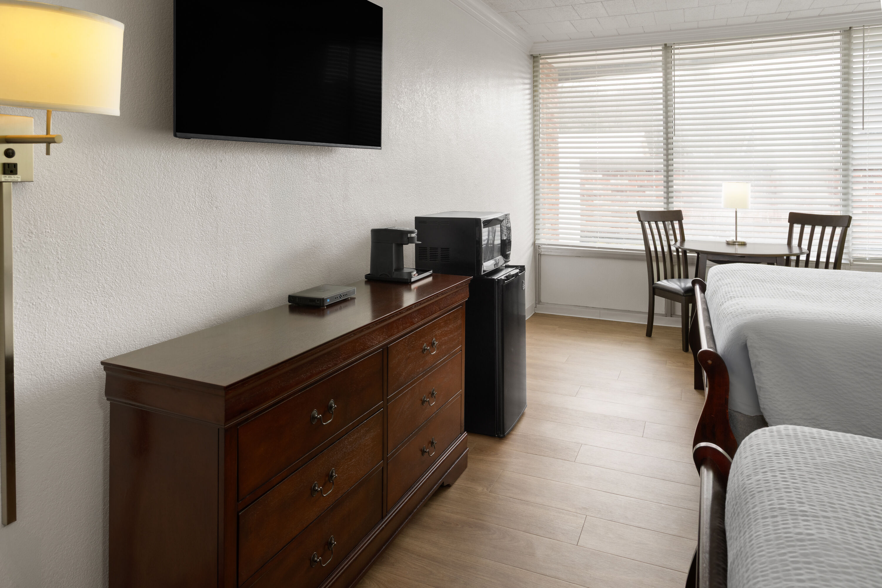 Guest room at the Ramada by Wyndham Butler/Tesla Biohealing Resort in Butler, Pennsylvania