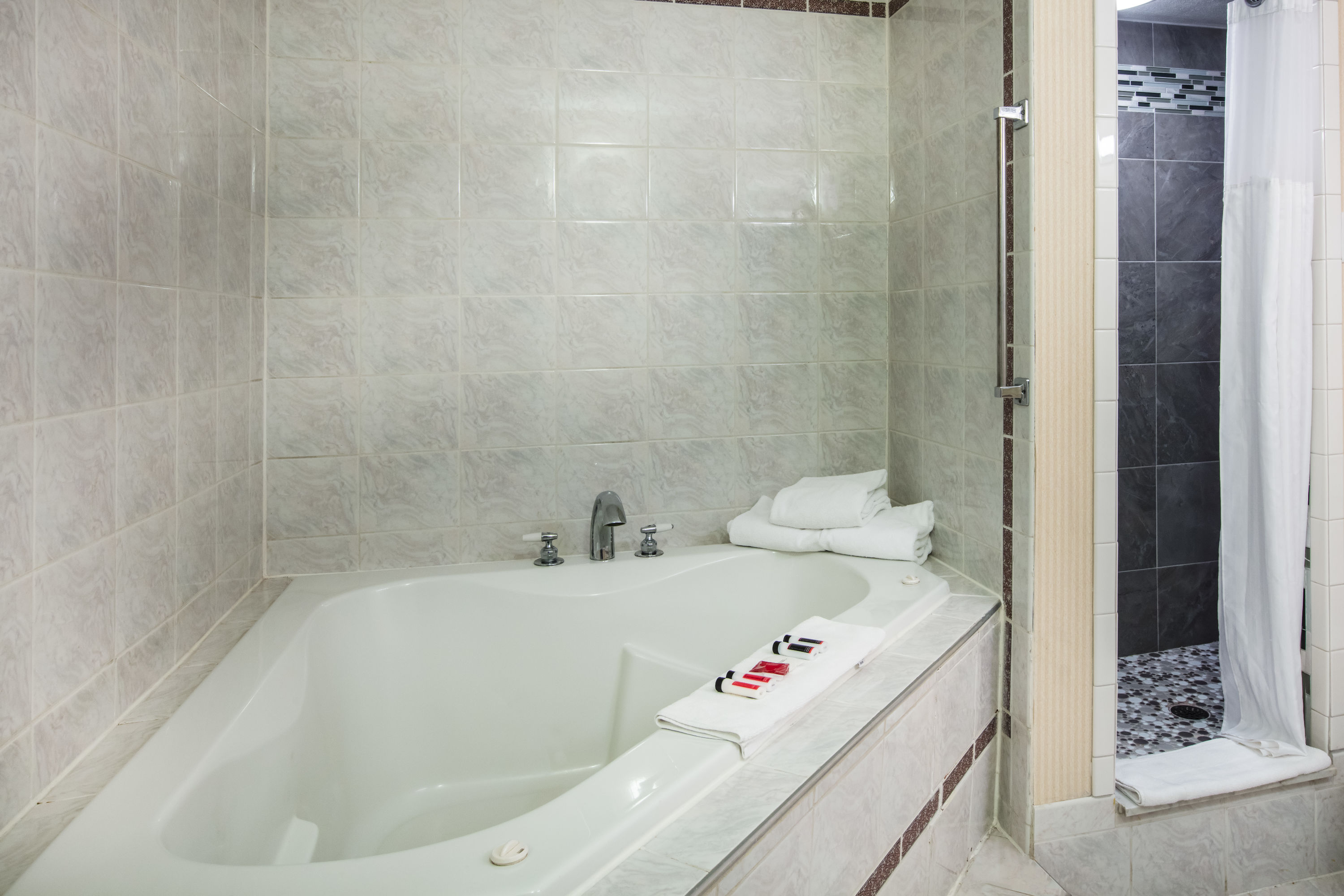 Guest room bath at the Ramada by Wyndham Ligonier in Ligonier, Pennsylvania