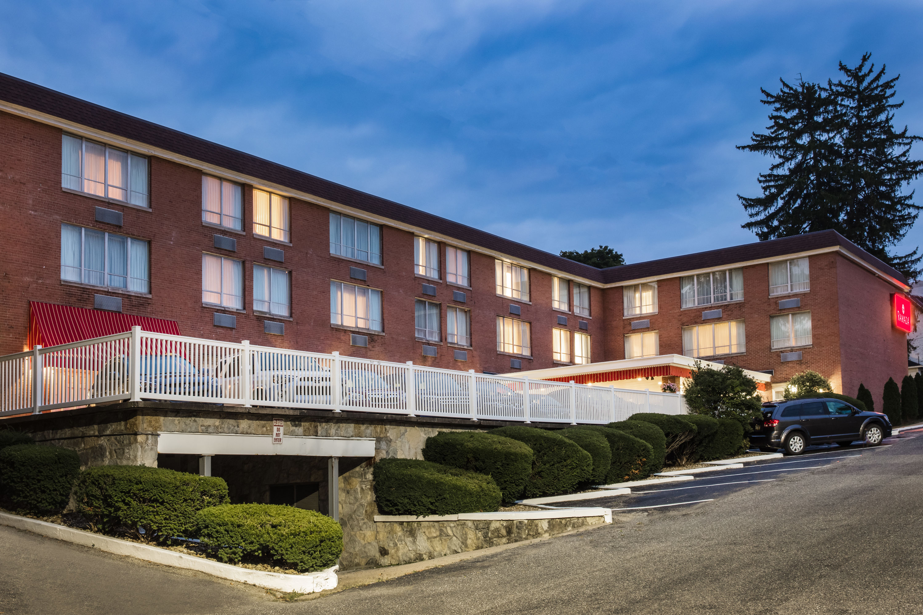 Exterior Dusk Image of Ramada by Wyndham Ligonier hotel in Ligonier, Pennsylvania