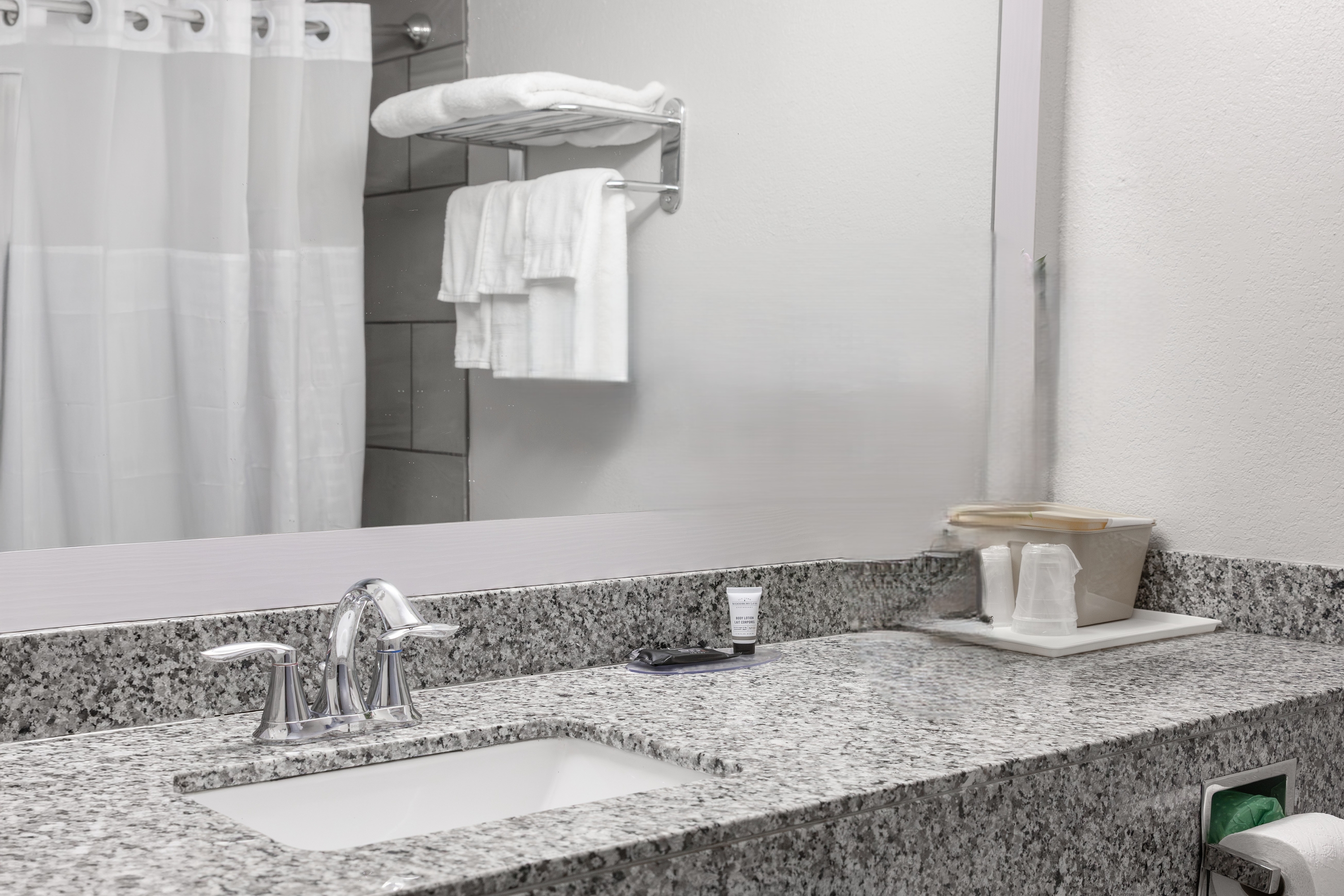 Guest room bath at the Ramada by Wyndham New Kensington in New Kensington, Pennsylvania