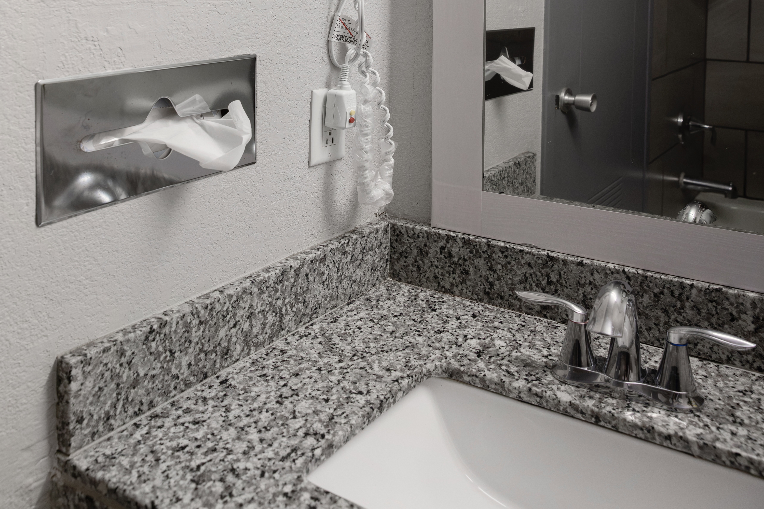 Guest room bath at the Ramada by Wyndham New Kensington in New Kensington, Pennsylvania