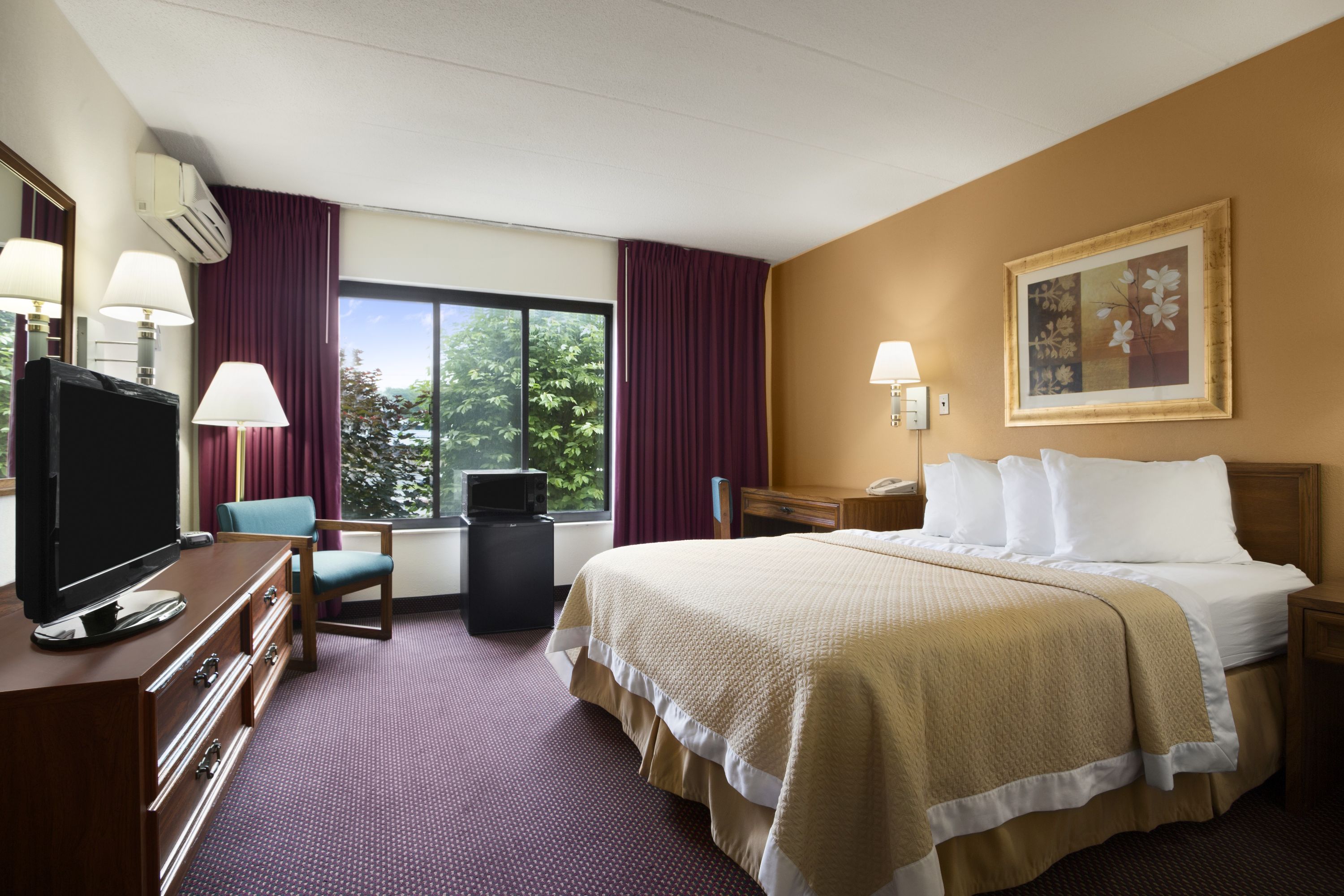 Guest room at the Ramada by Wyndham Pittsburgh/New Stanton in New Stanton, Pennsylvania