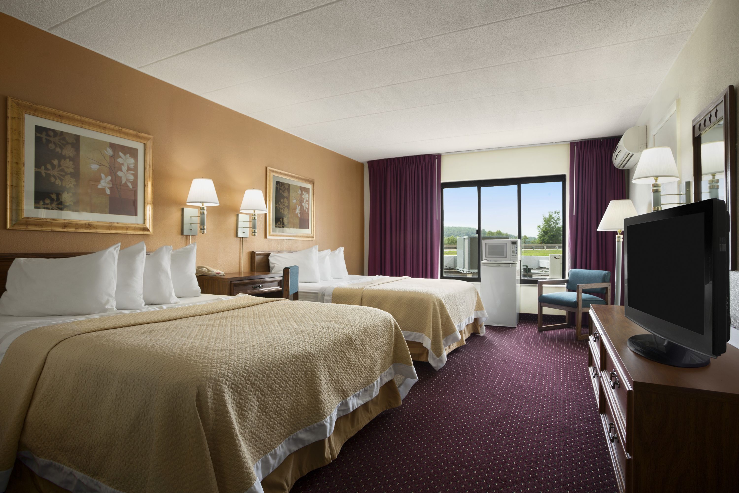 Guest room at the Ramada by Wyndham Pittsburgh/New Stanton in New Stanton, Pennsylvania
