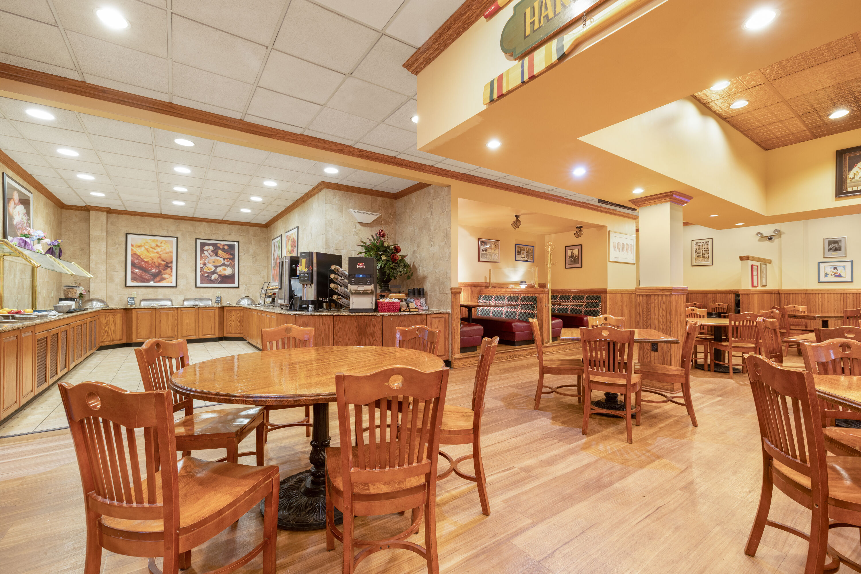 Ramada by Wyndham State College Hotel & Conference Center restaurant breakfast area with seating in State College, Pennsylvania