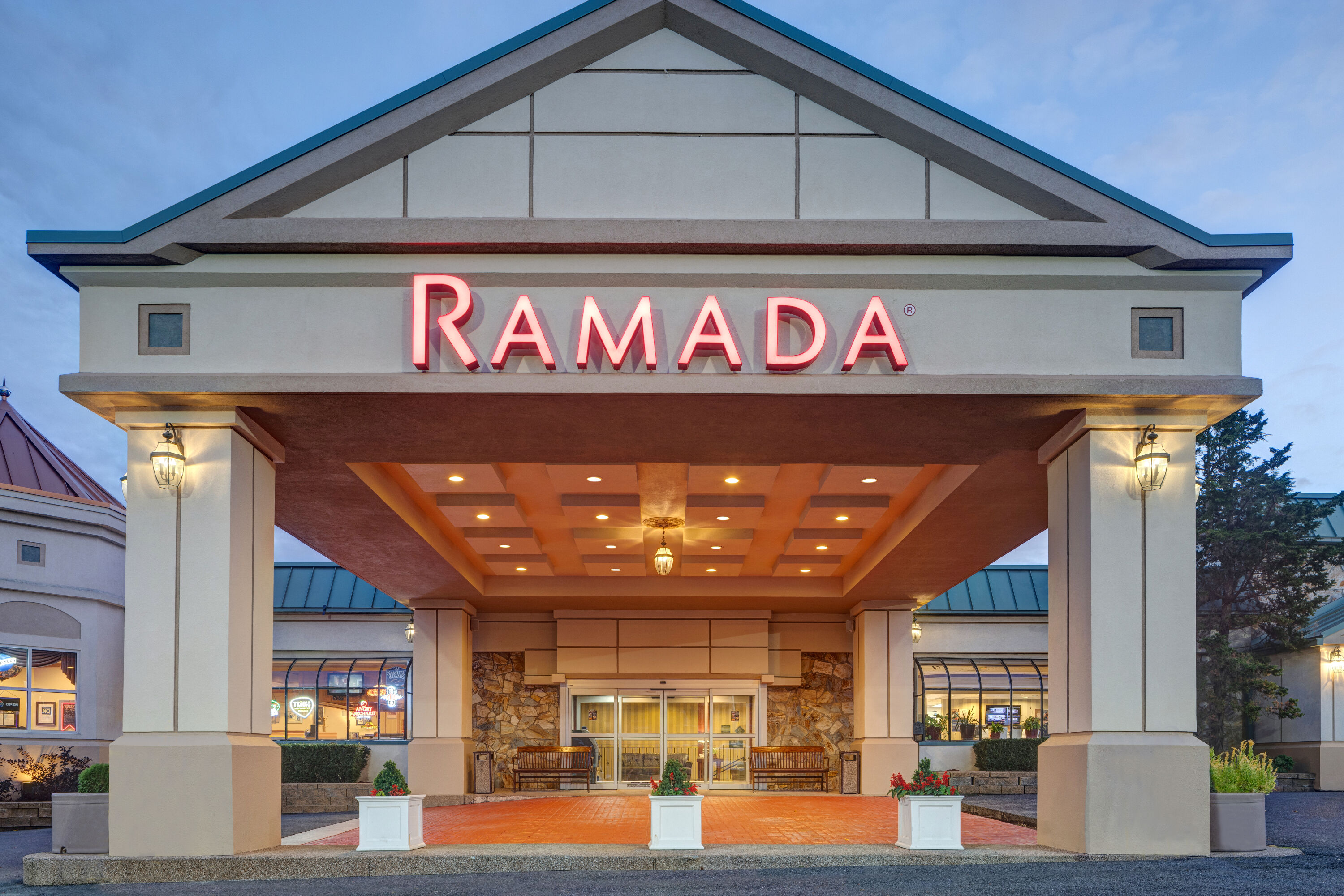Exterior Dusk Image of Ramada by Wyndham State College Hotel & Conference Center hotel in State College, Pennsylvania