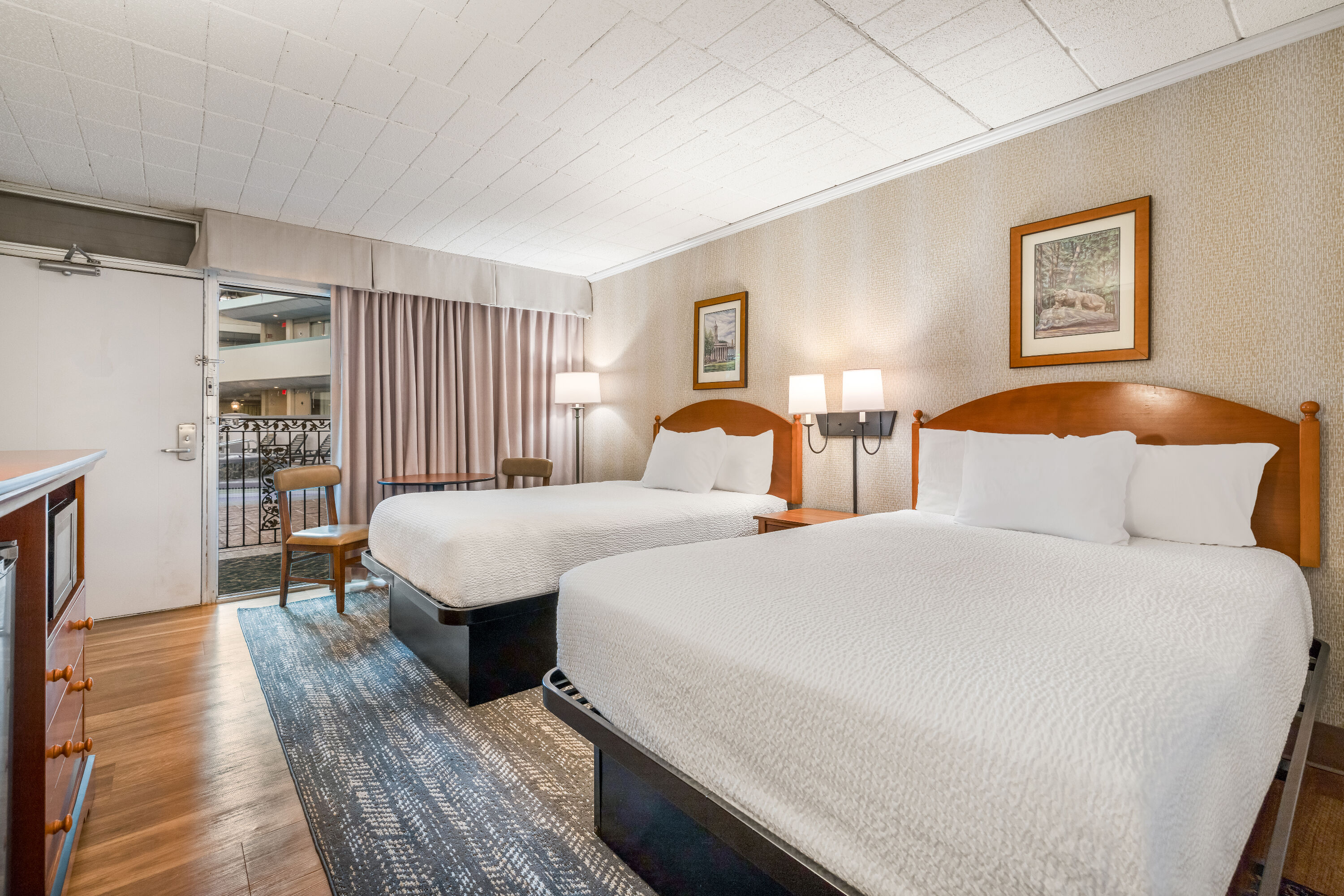 Double bed guest room at the Ramada by Wyndham State College Hotel & Conference Center in State College, Pennsylvania