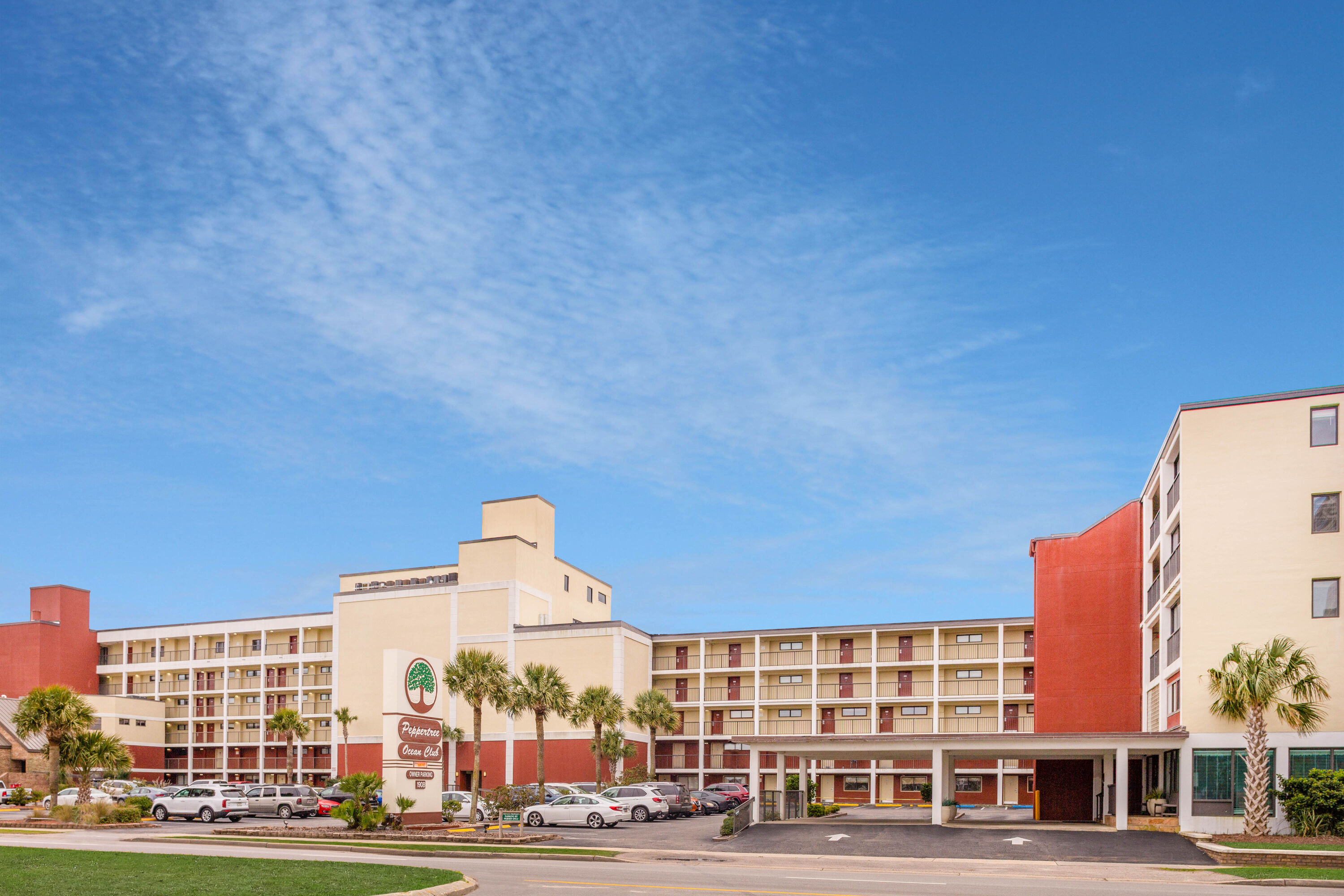Exterior Day Image of Ocean Club Resort Myrtle Beach a Ramada by Wyndham hotel in North Myrtle Beach, South Carolina