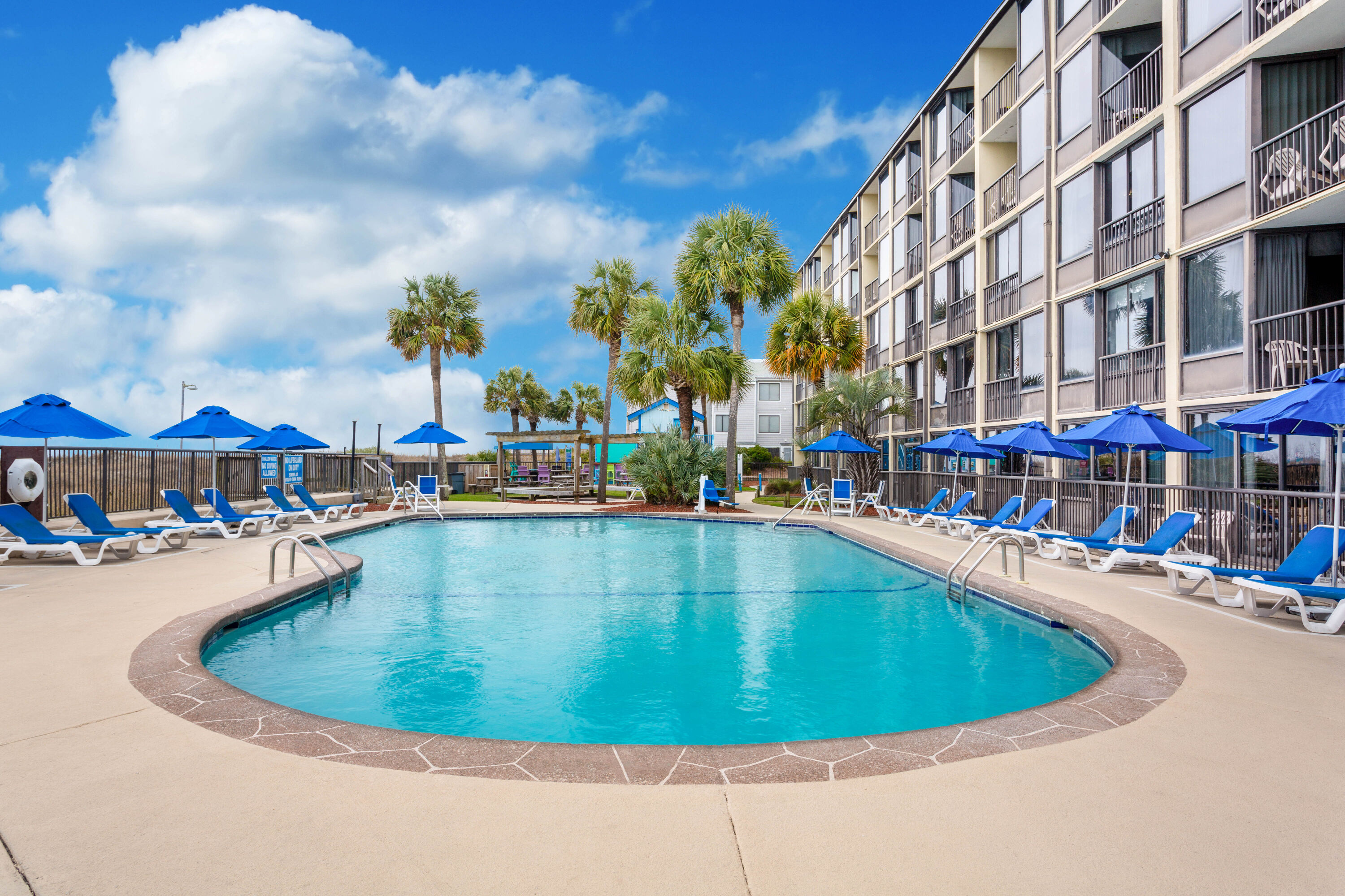 Pool at the Ocean Club Resort Myrtle Beach a Ramada by Wyndham in North Myrtle Beach, South Carolina