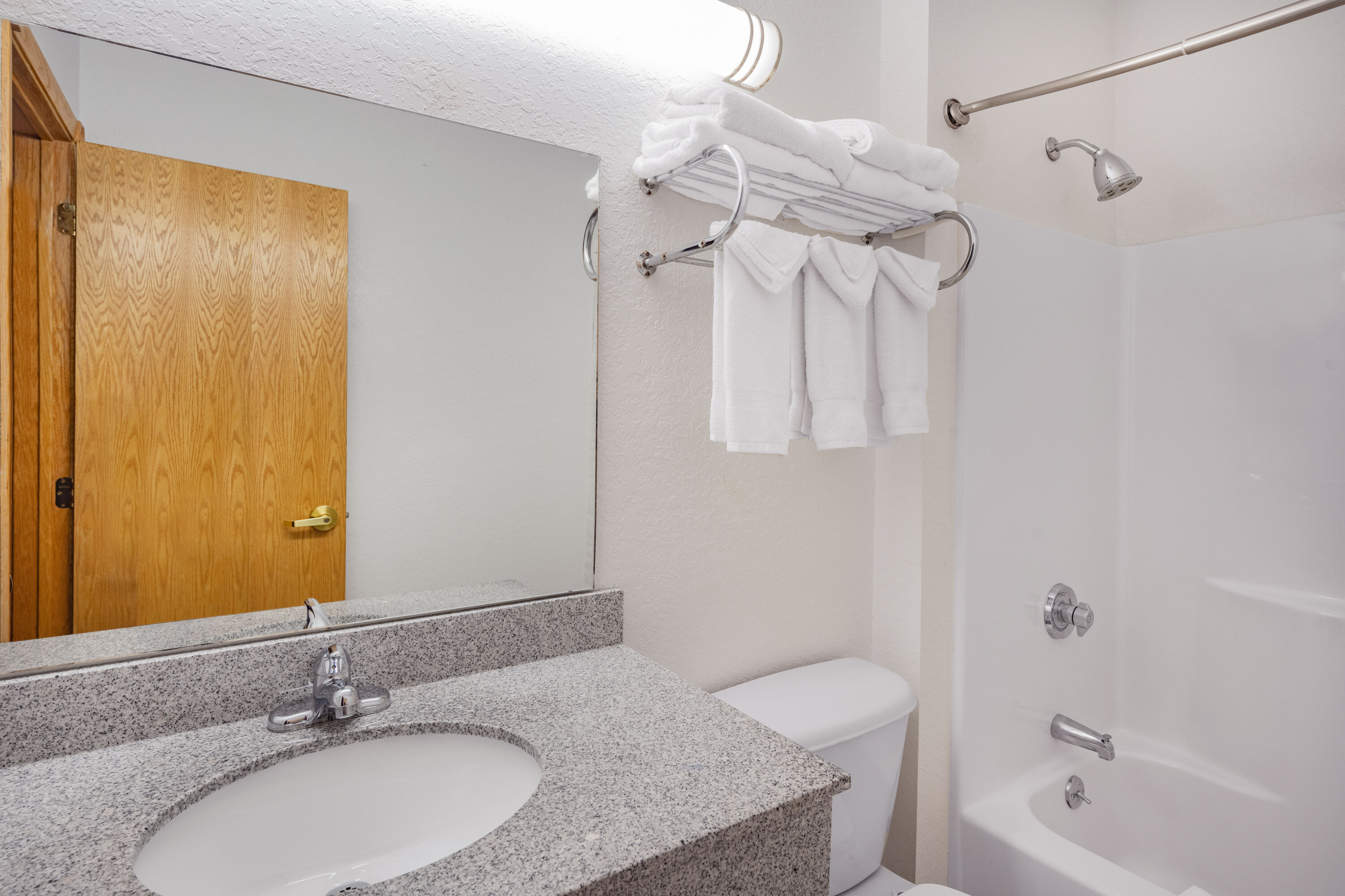 Guest room bath at the Ramada by Wyndham Keystone Near Mt Rushmore in Keystone, South Dakota